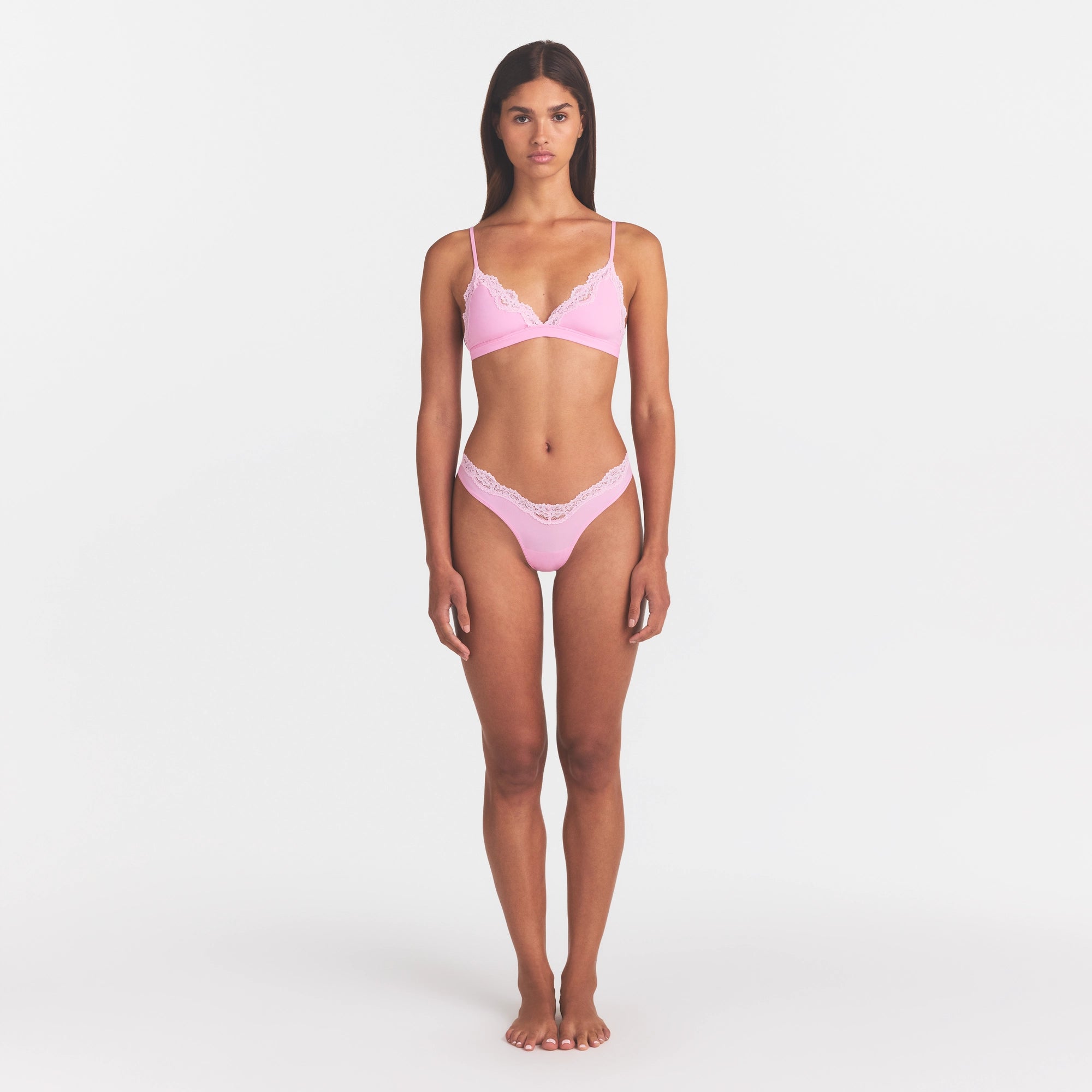 FITS EVERYBODY LACE TRIANGLE BRALETTE | BUBBLEGUM TONAL ON A MODEL FRONT VIEW