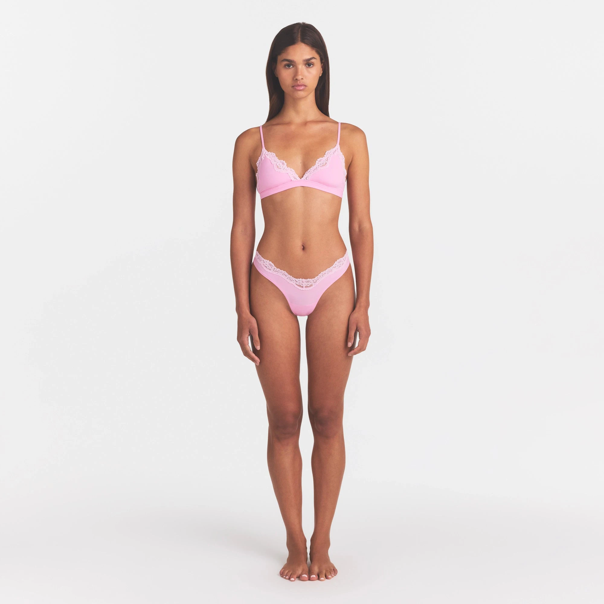 FITS EVERYBODY LACE TRIANGLE BRALETTE | BUBBLEGUM TONAL ON A MODEL FRONT VIEW