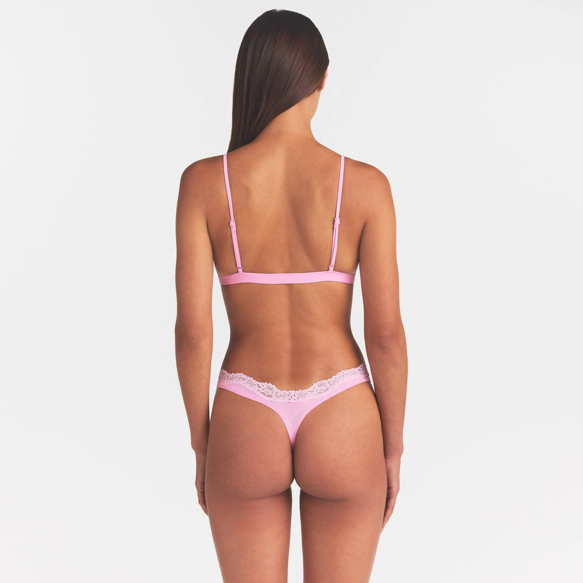 FITS EVERYBODY LACE TRIANGLE BRALETTE | BUBBLEGUM TONAL ON A MODEL SIDE VIEW