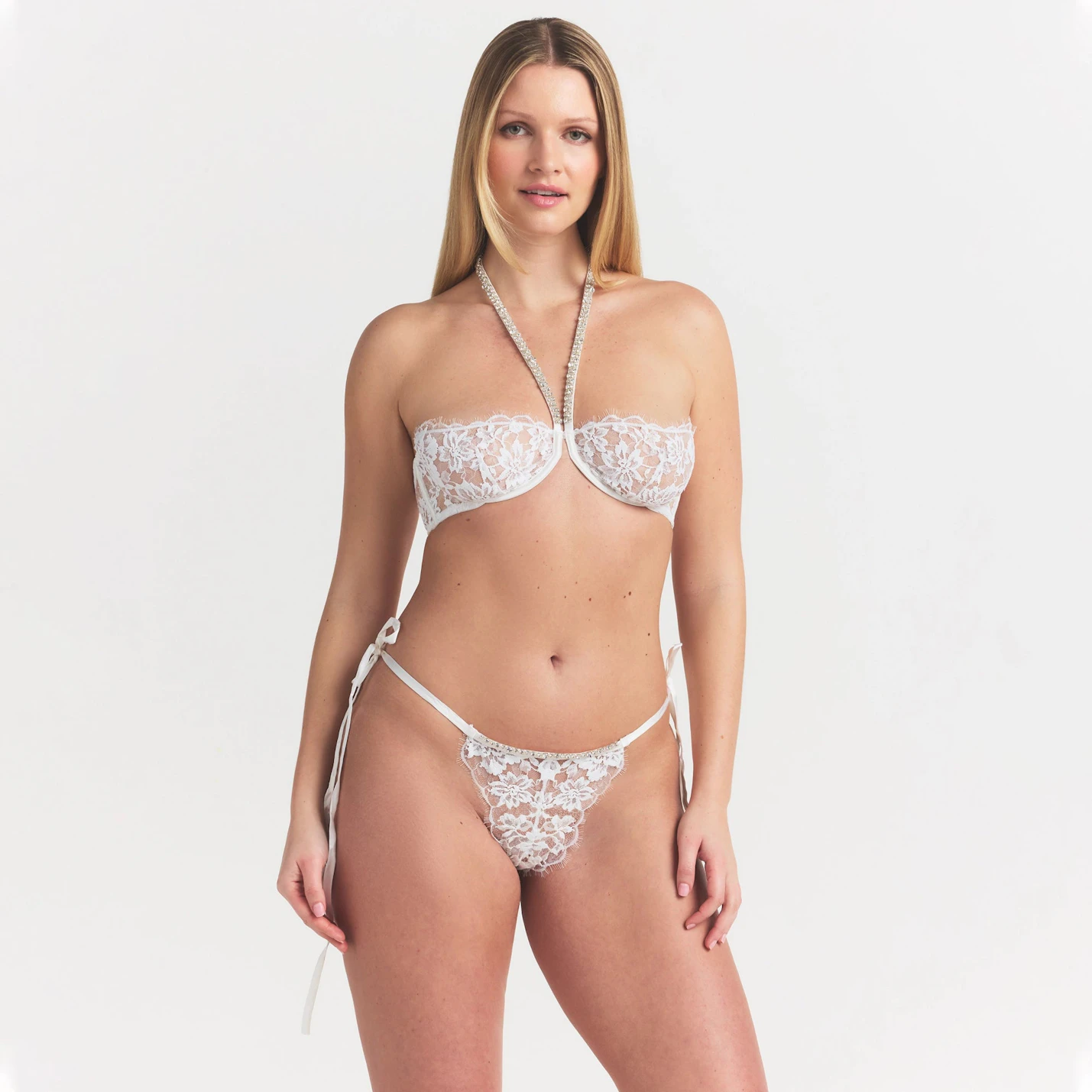 SKIMS LACE UNLINED HALTER BRA | SNOW ON A MODEL SIDE VIEW