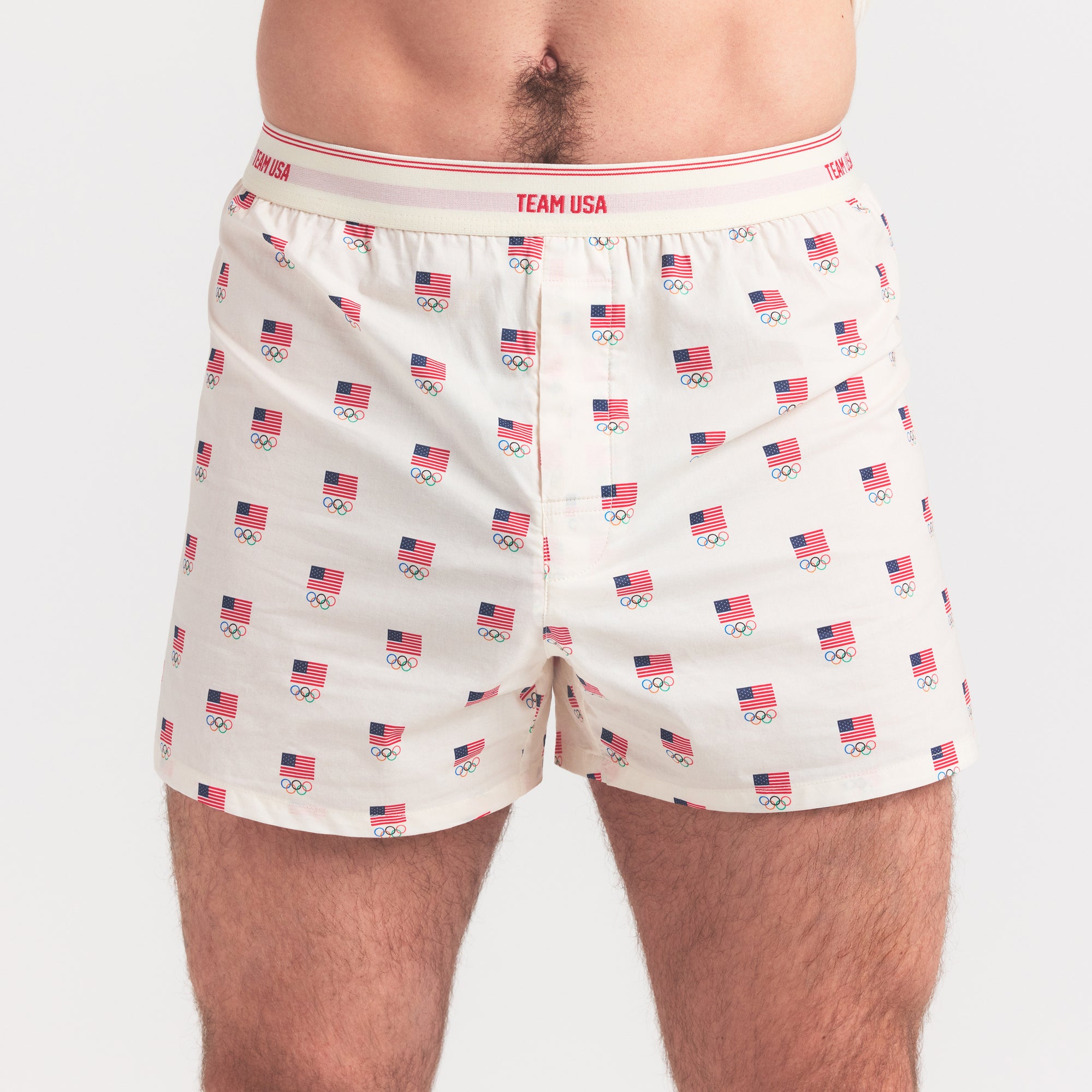 SKIMS FOR TEAM USA COTTON POPLIN MENS OLYMPIC BOXER | ECRU ON A MODEL SIDE VIEW @ | FOCUS: 0.0, 1.0, 0.9