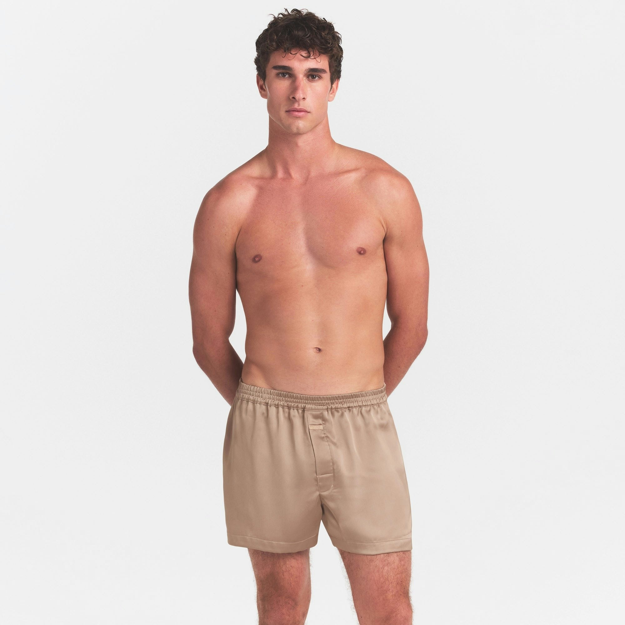 SATEEN SLEEP MENS 3" BOXER SHORT | LATTE ON A MODEL SIDE VIEW @ | FOCUS: 0.0, 1.0, 0.9
