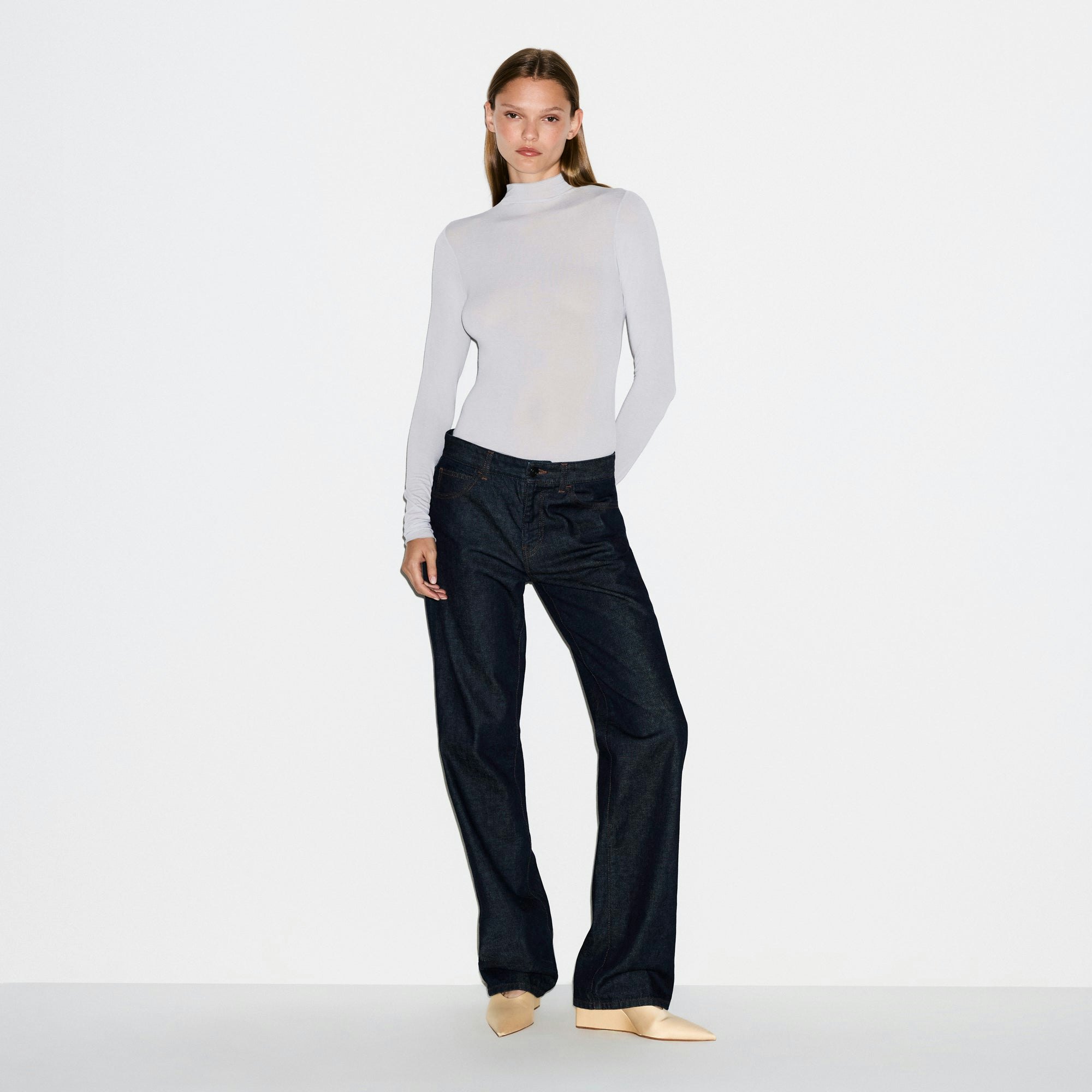 SHEER MODAL LONG SLEEVE TURTLENECK BODYSUIT | MIST ON A MODEL FRONT VIEW @ | FOCUS: 0.0, 1.0, 0.9