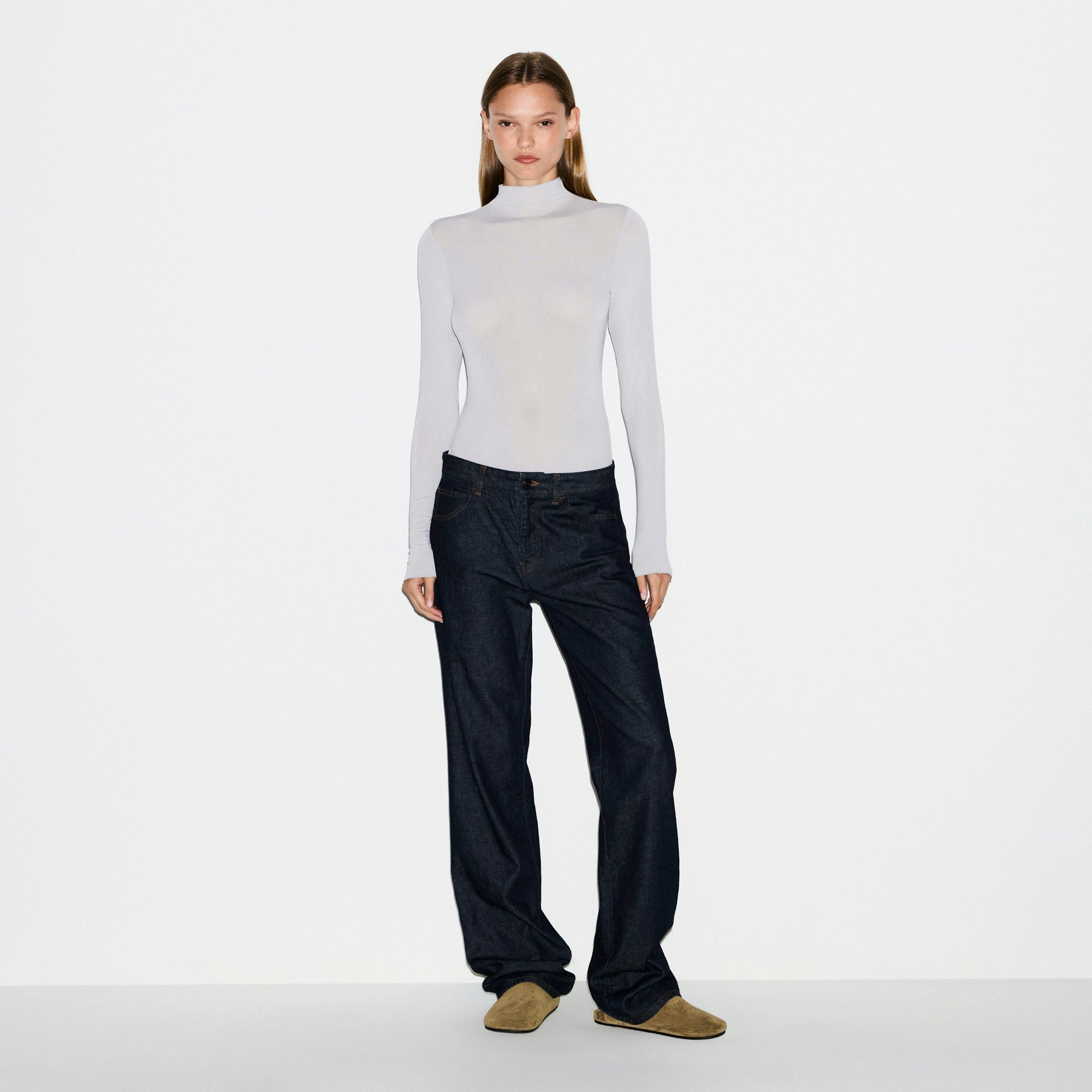 SHEER MODAL LONG SLEEVE TURTLENECK BODYSUIT | MIST ON A MODEL FRONT VIEW @ | FOCUS: 0.0, 1.0, 0.9