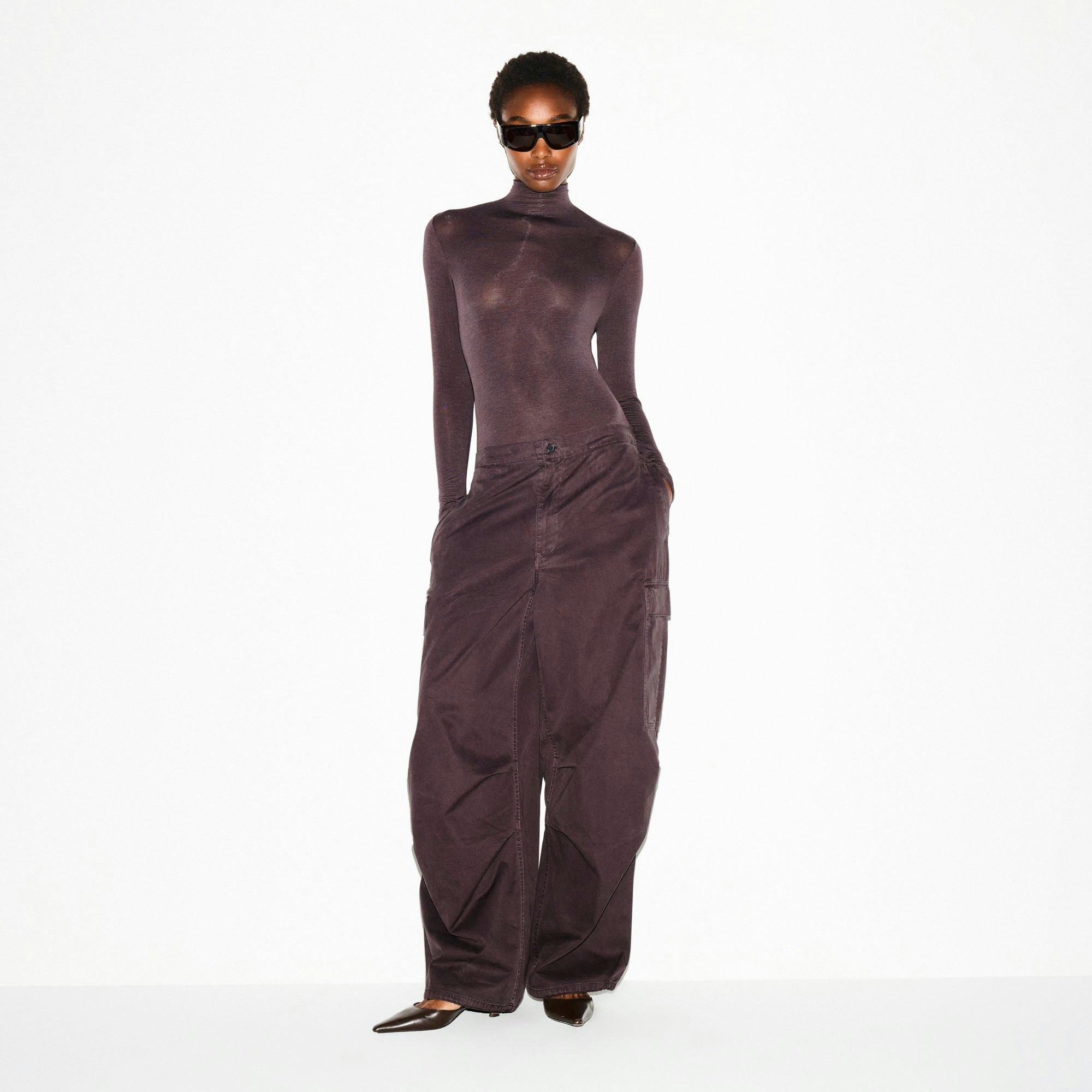 SHEER MODAL LONG SLEEVE TURTLENECK BODYSUIT | PHOENIX ON A MODEL FRONT VIEW @ | FOCUS: 0.0, 1.0, 0.9