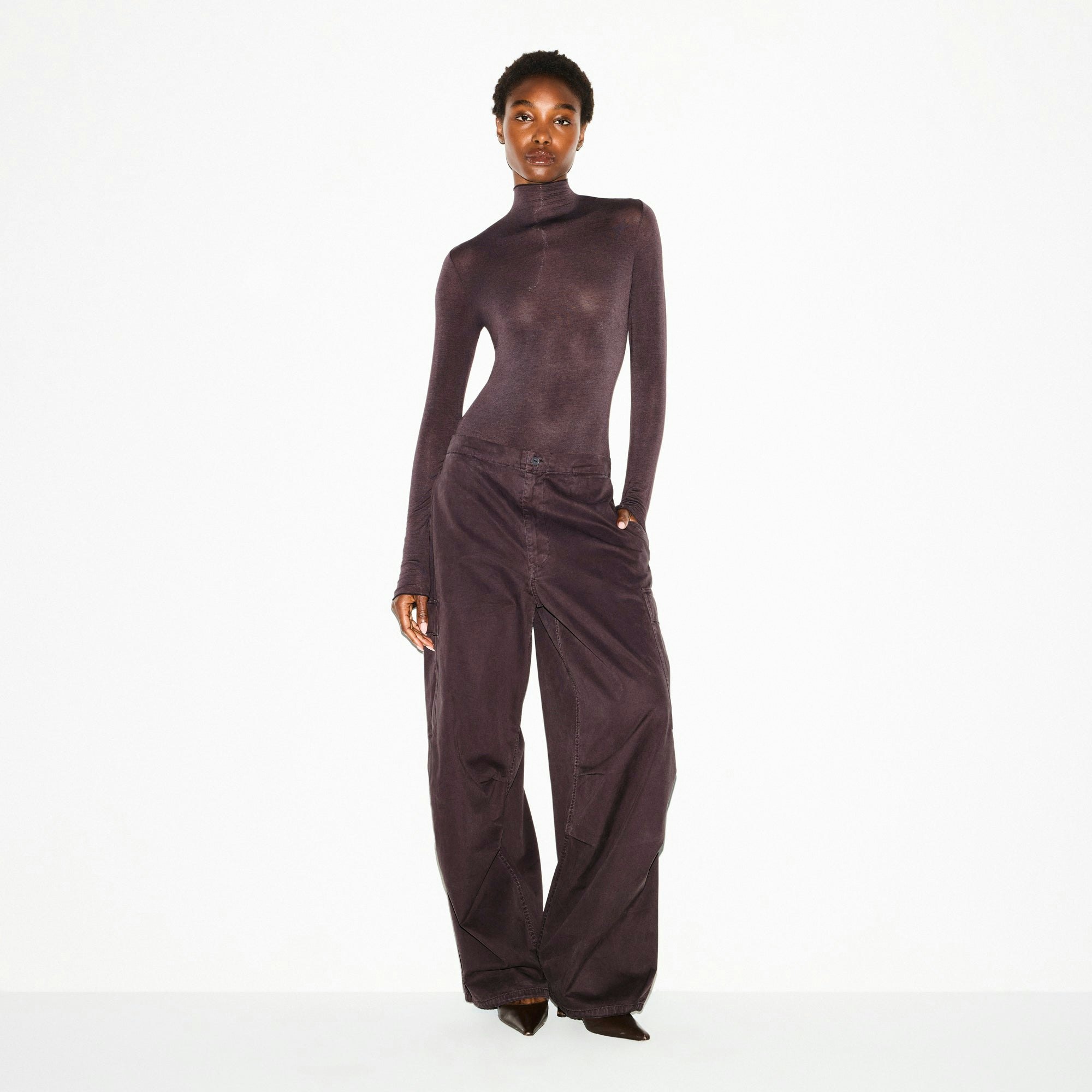 SHEER MODAL LONG SLEEVE TURTLENECK BODYSUIT | PHOENIX ON A MODEL FRONT VIEW @ | FOCUS: 0.0, 1.0, 0.9