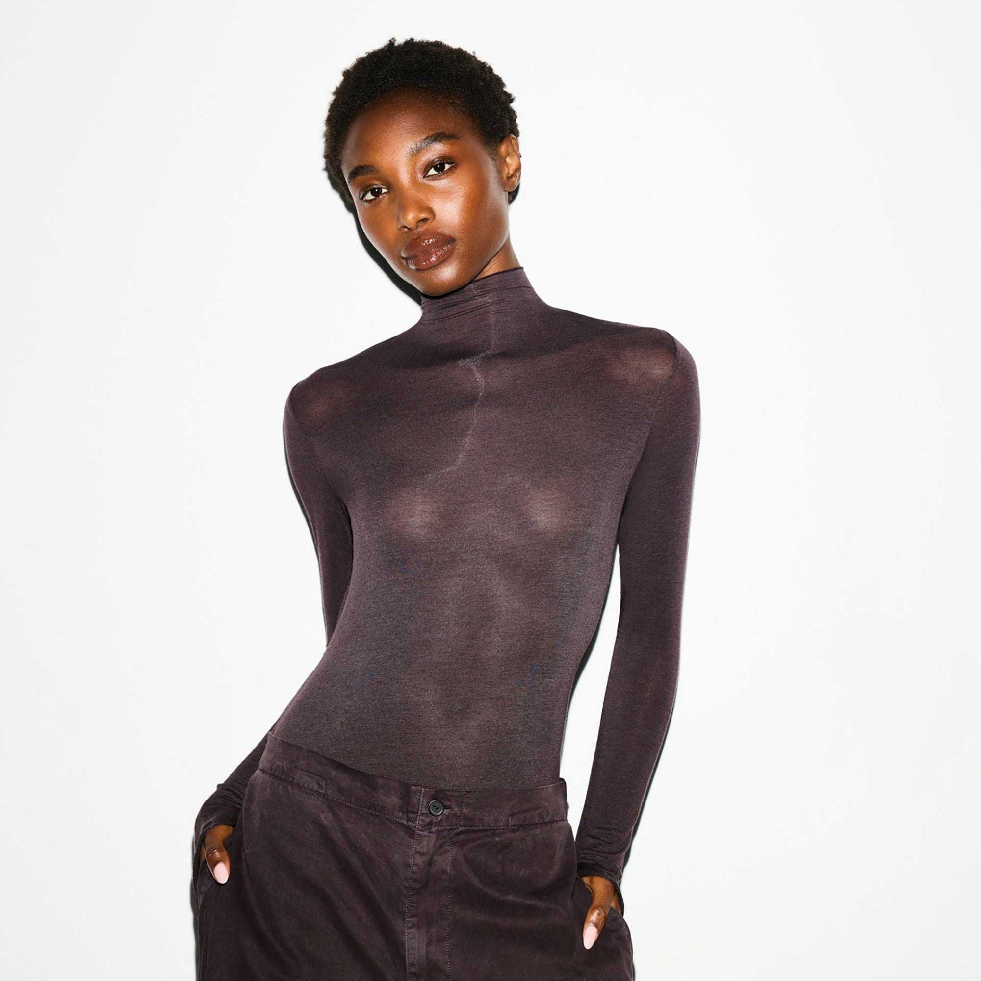 SHEER MODAL LONG SLEEVE TURTLENECK BODYSUIT | PHOENIX ON A MODEL FRONT VIEW @ | FOCUS: 0.0, 1.0, 0.9