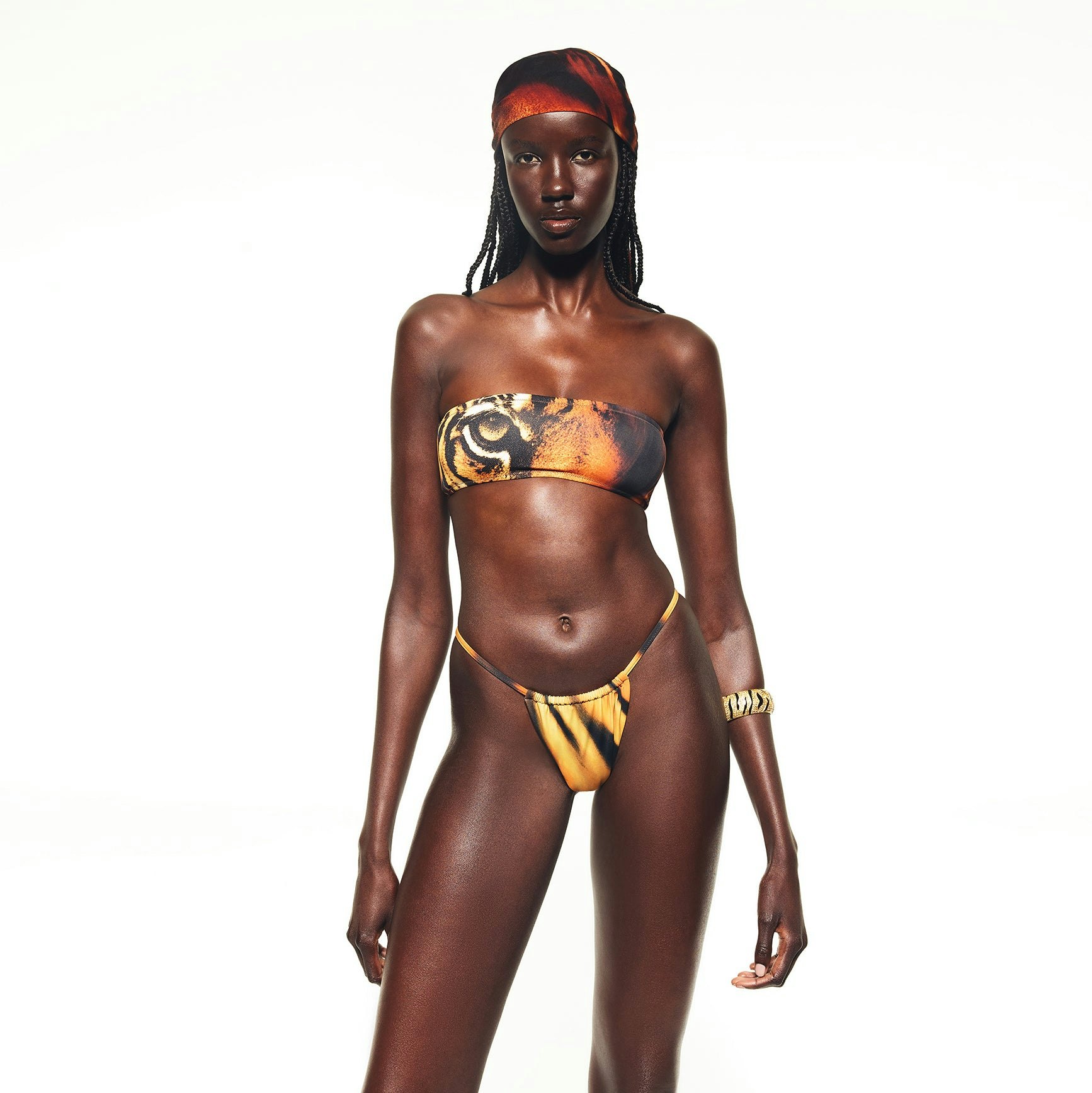 ROBERTO CAVALLI X SKIMS MICRO BANDEAU BIKINI TOP | TIGER FACE PRINT ON A MODEL FRONT VIEW | FOCUS: 0.0, 1.0, 0.9