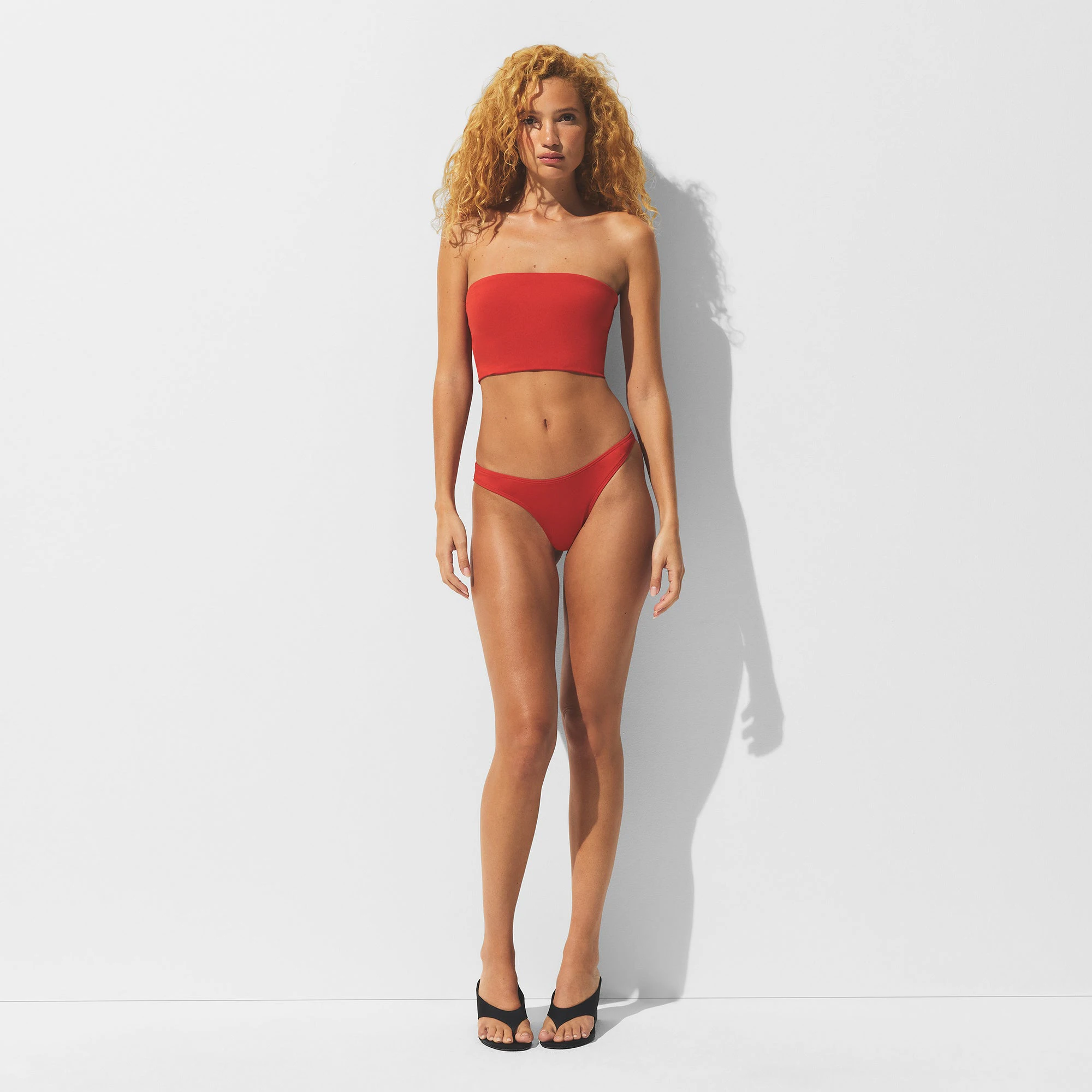 MINIMAL SWIM CONVERTIBLE BANDEAU BIKINI TOP | TERRA ON A MODEL FRONT VIEW | FOCUS: 0.0, 1.0, 0.9