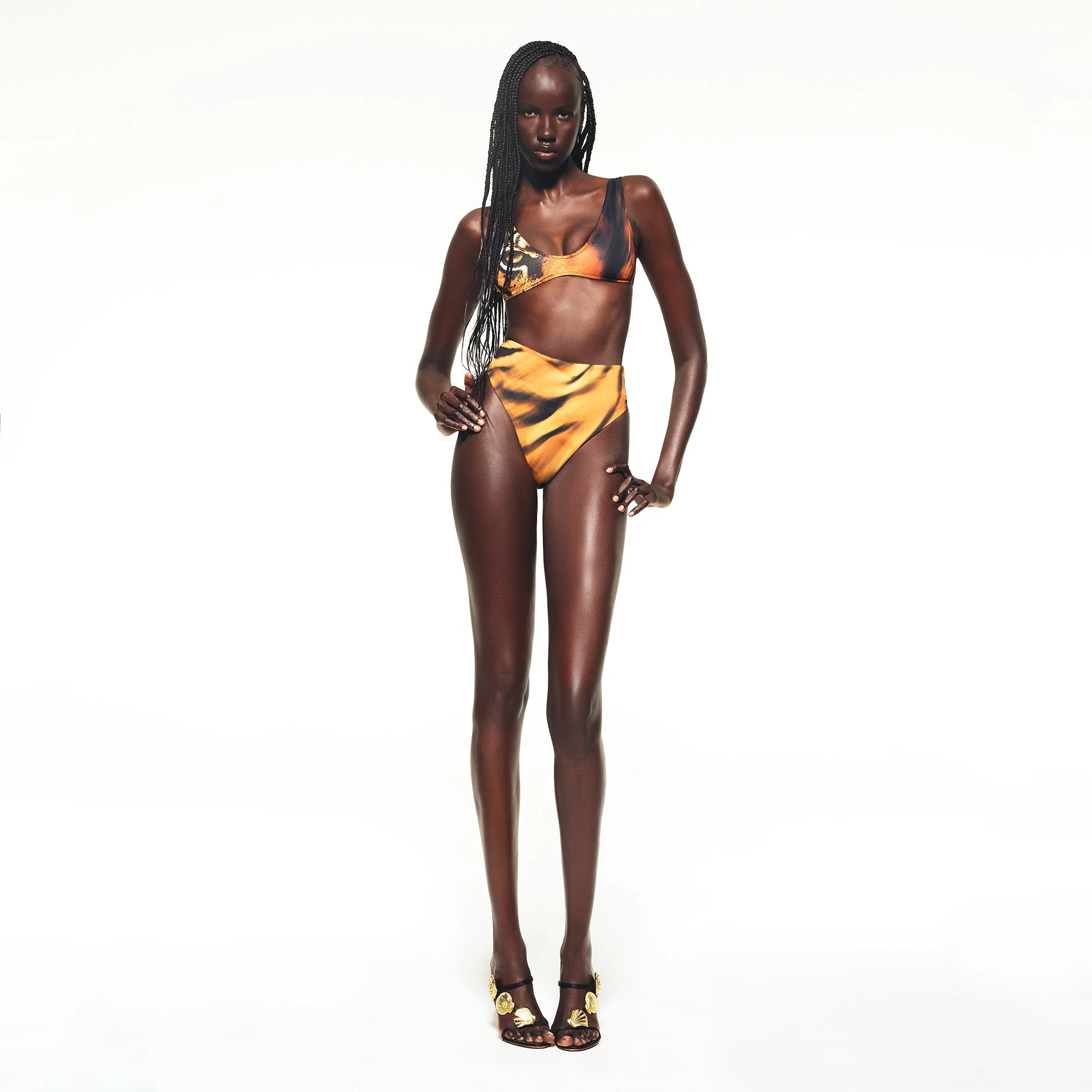 ROBERTO CAVALLI X SKIMS PLUNGE BIKINI TOP | TIGER FACE PRINT ON A MODEL FRONT VIEW | FOCUS: 0.0, 1.0, 0.9