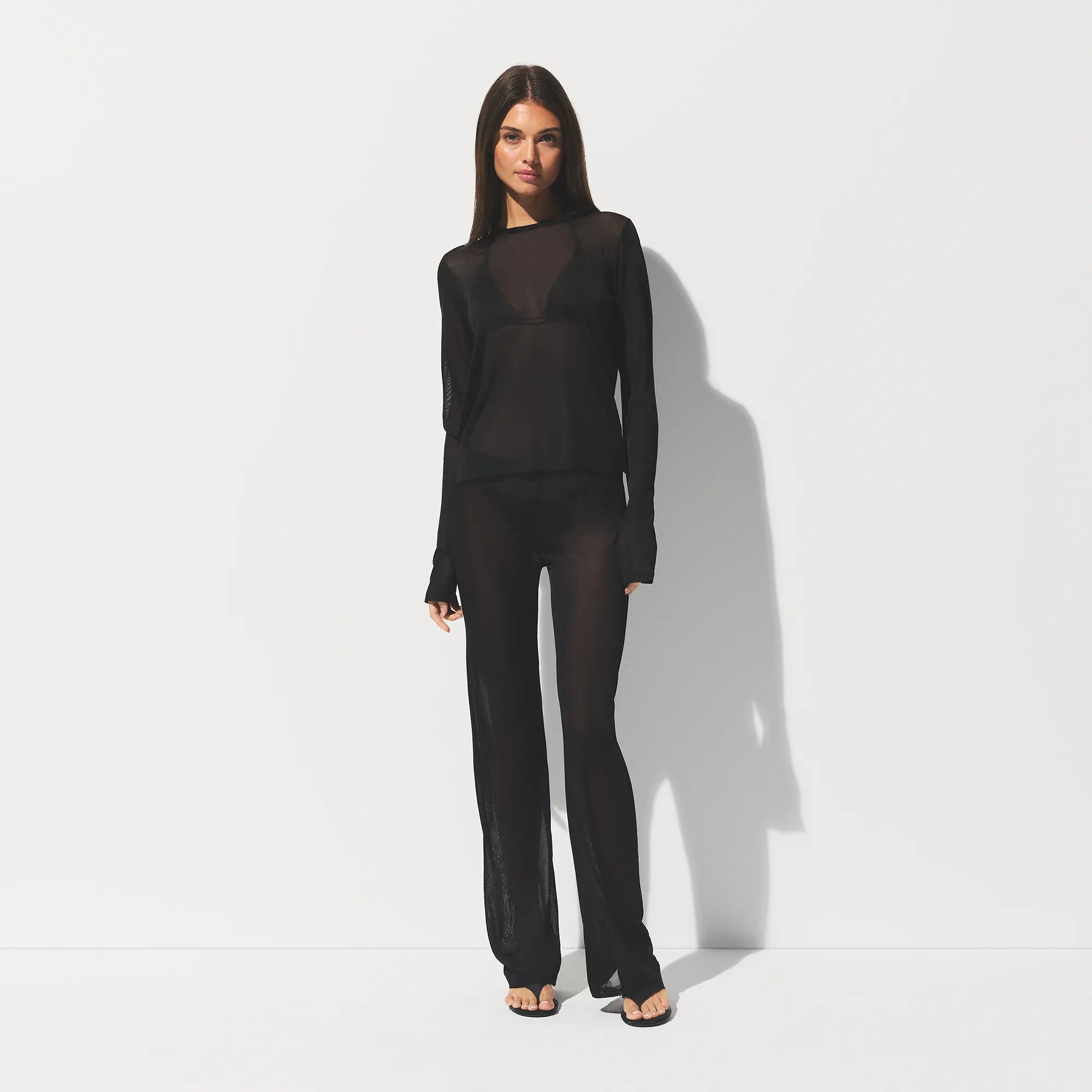 SLINKY KNIT LOW RISE PANT | OBSIDIAN ON A MODEL FRONT VIEW @ | FOCUS: 0.0, 1.0, 0.9