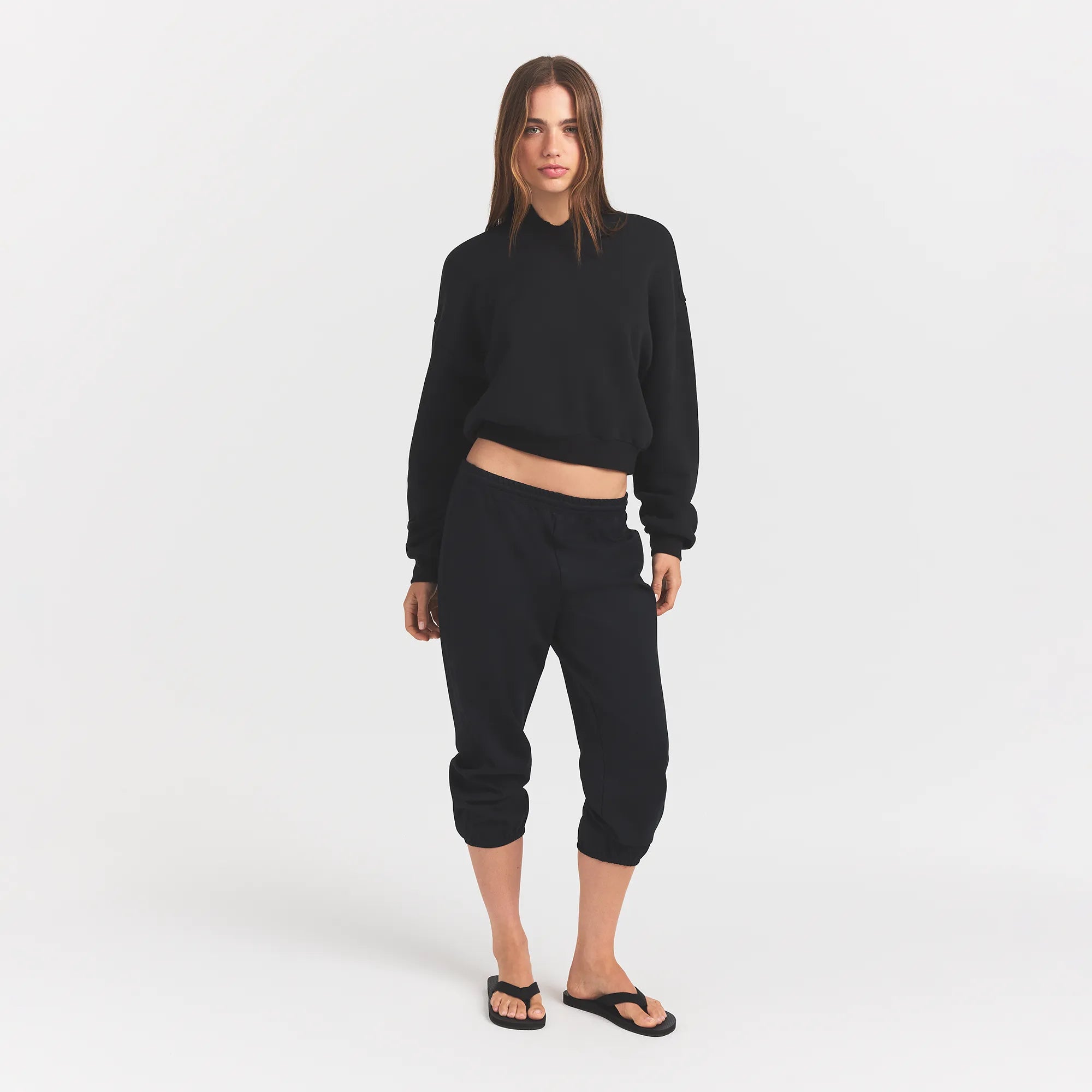 HEAVYWEIGHT CREPE CROPPED JOGGER | OBSIDIAN ON A MODEL FRONT VIEW @ | FOCUS: 0.0, 1.0, 0.9