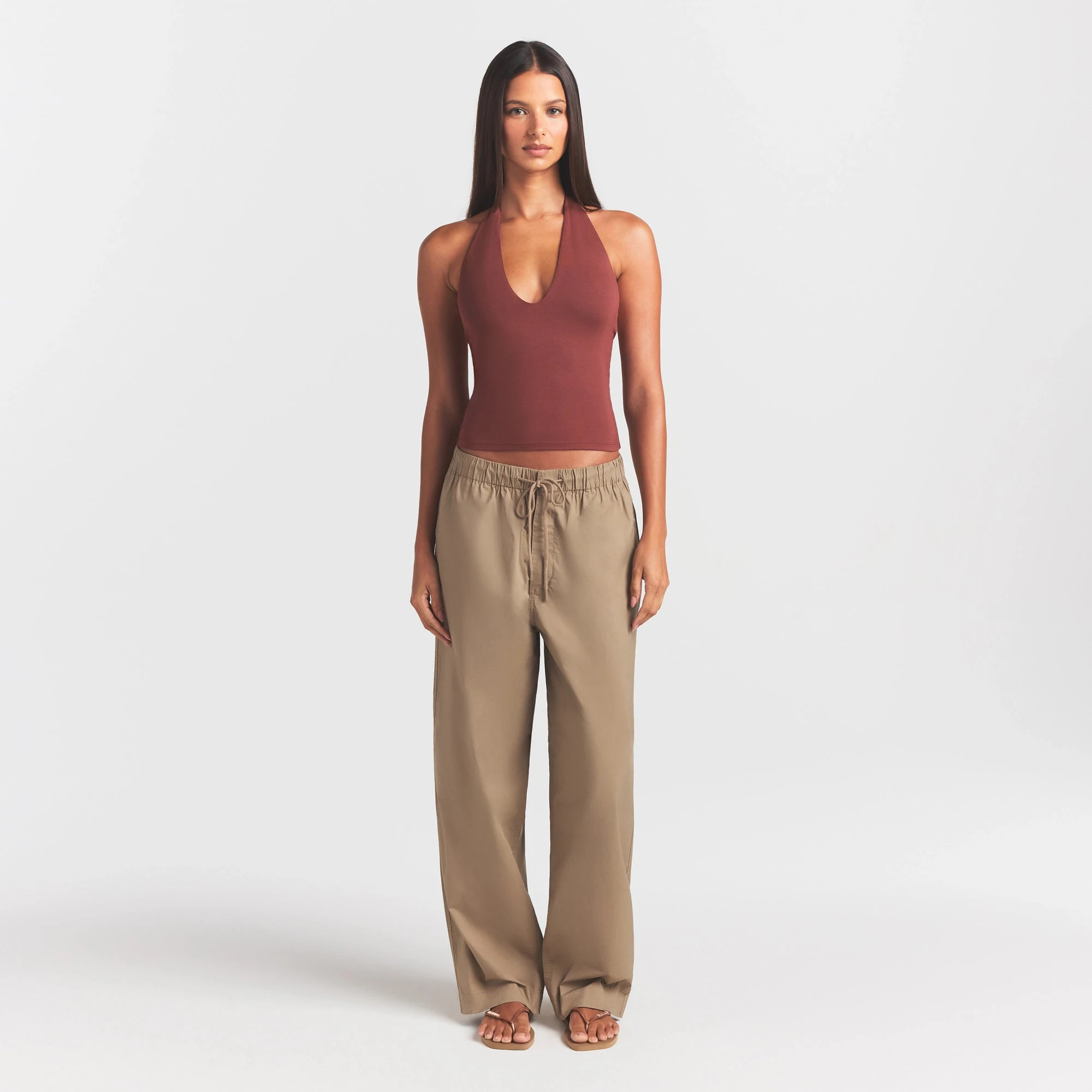 WOVEN COTTON OVERSIZED STRAIGHT LEG PANT | DESERT ON A MODEL FRONT VIEW @ | FOCUS: 0.0, 1.0, 0.9