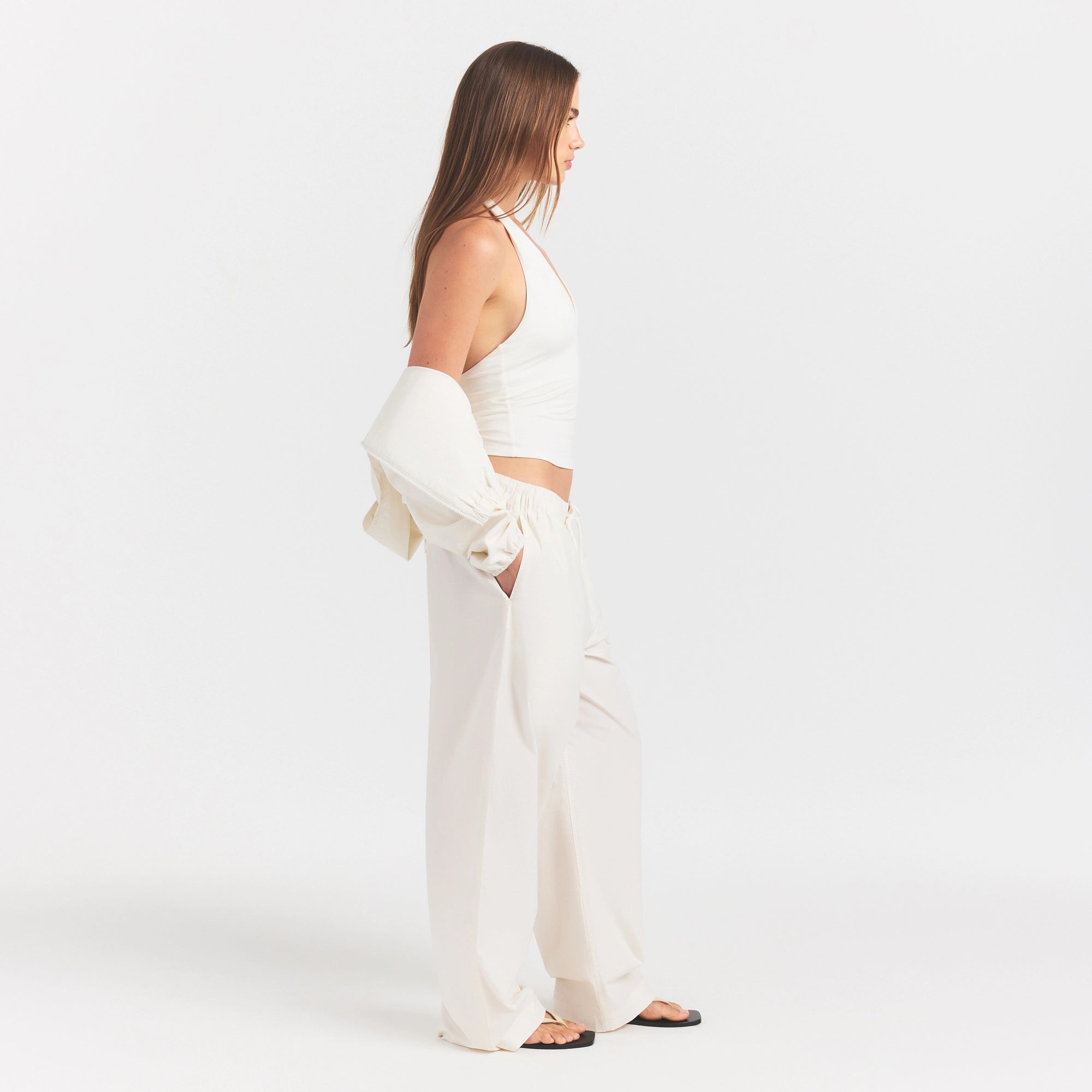 WOVEN COTTON OVERSIZED STRAIGHT LEG PANT | EGRET ON A MODEL FRONT VIEW @ | FOCUS: 0.0, 1.0, 0.9