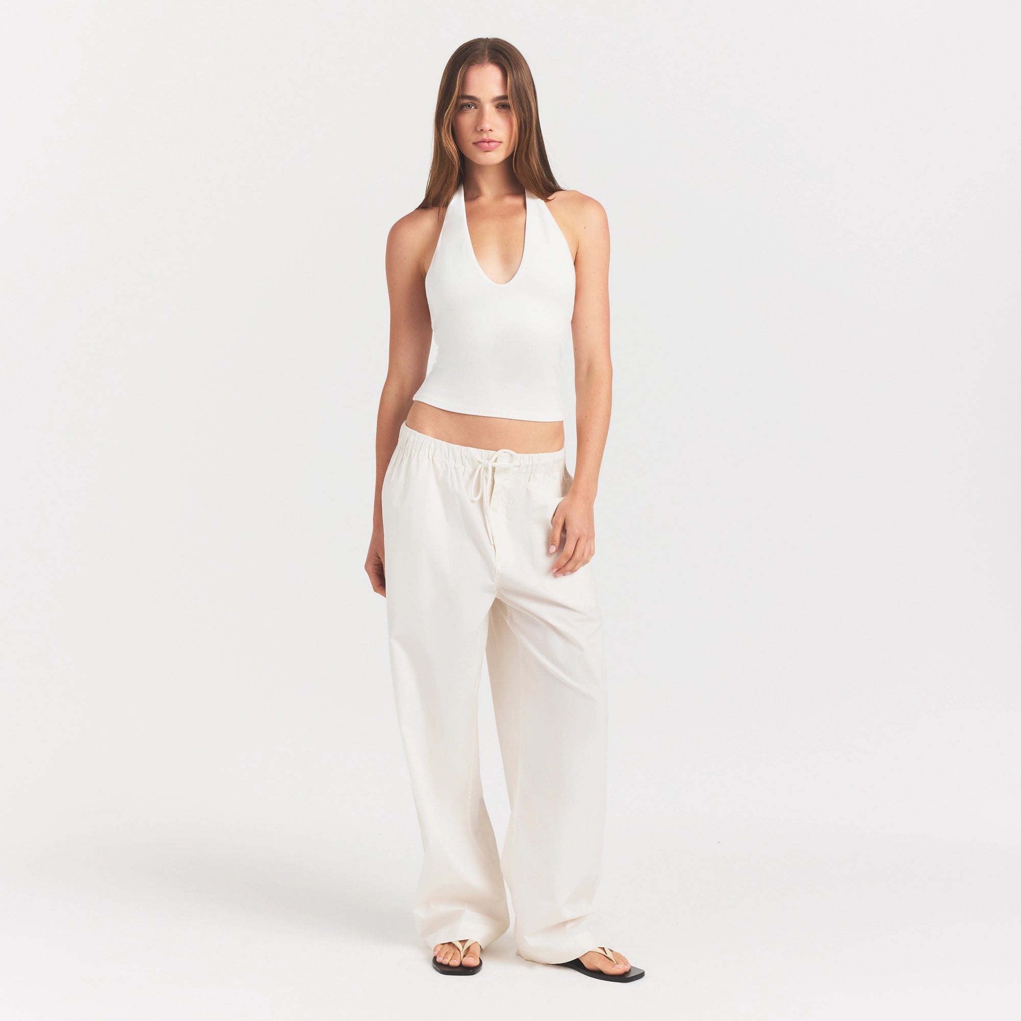 WOVEN COTTON OVERSIZED STRAIGHT LEG PANT | EGRET ON A MODEL FRONT VIEW @ | FOCUS: 0.0, 1.0, 0.9
