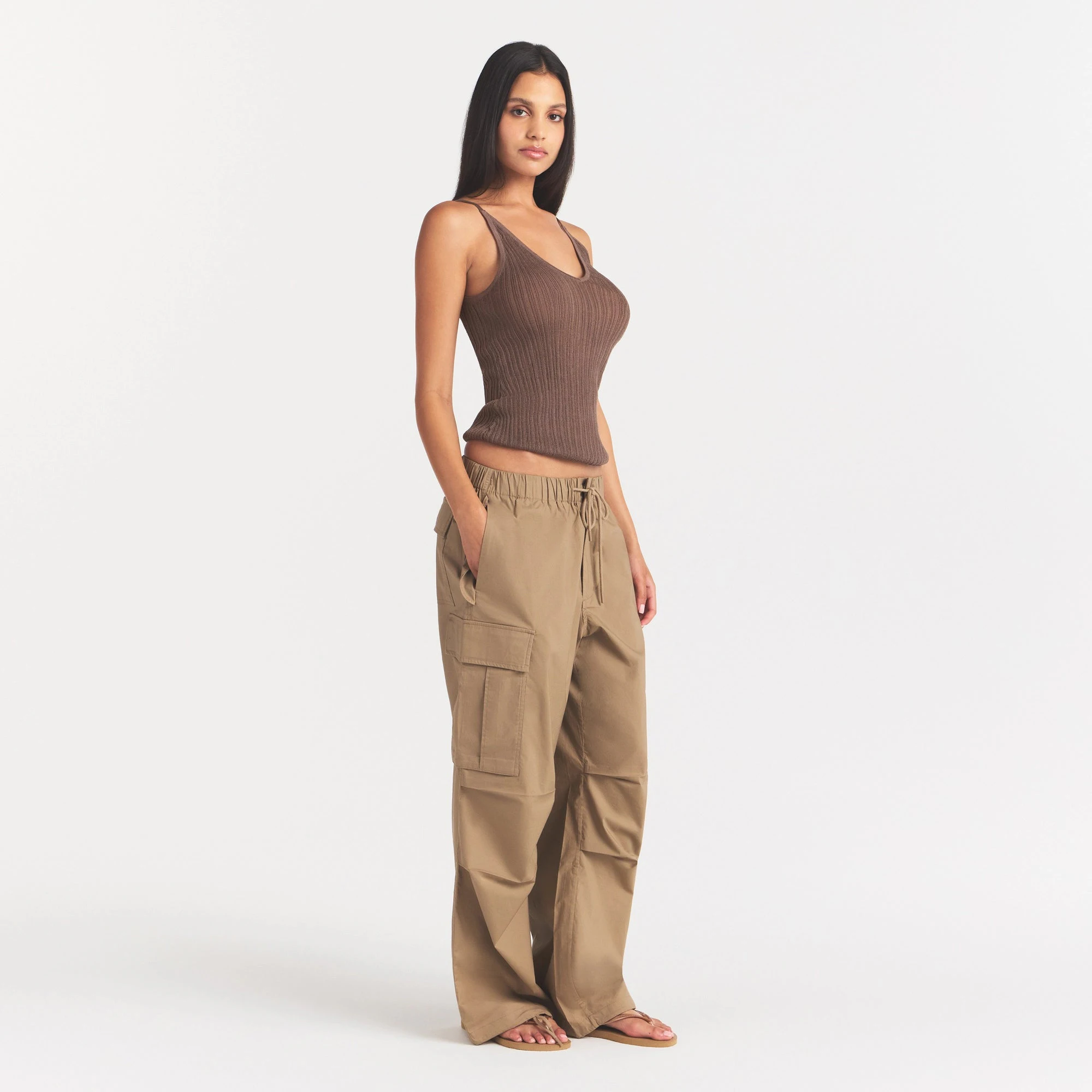WOVEN COTTON OVERSIZED LOW RISE CARGO PANT | DESERT ON A MODEL FRONT VIEW @ | FOCUS: 0.0, 1.0, 0.9