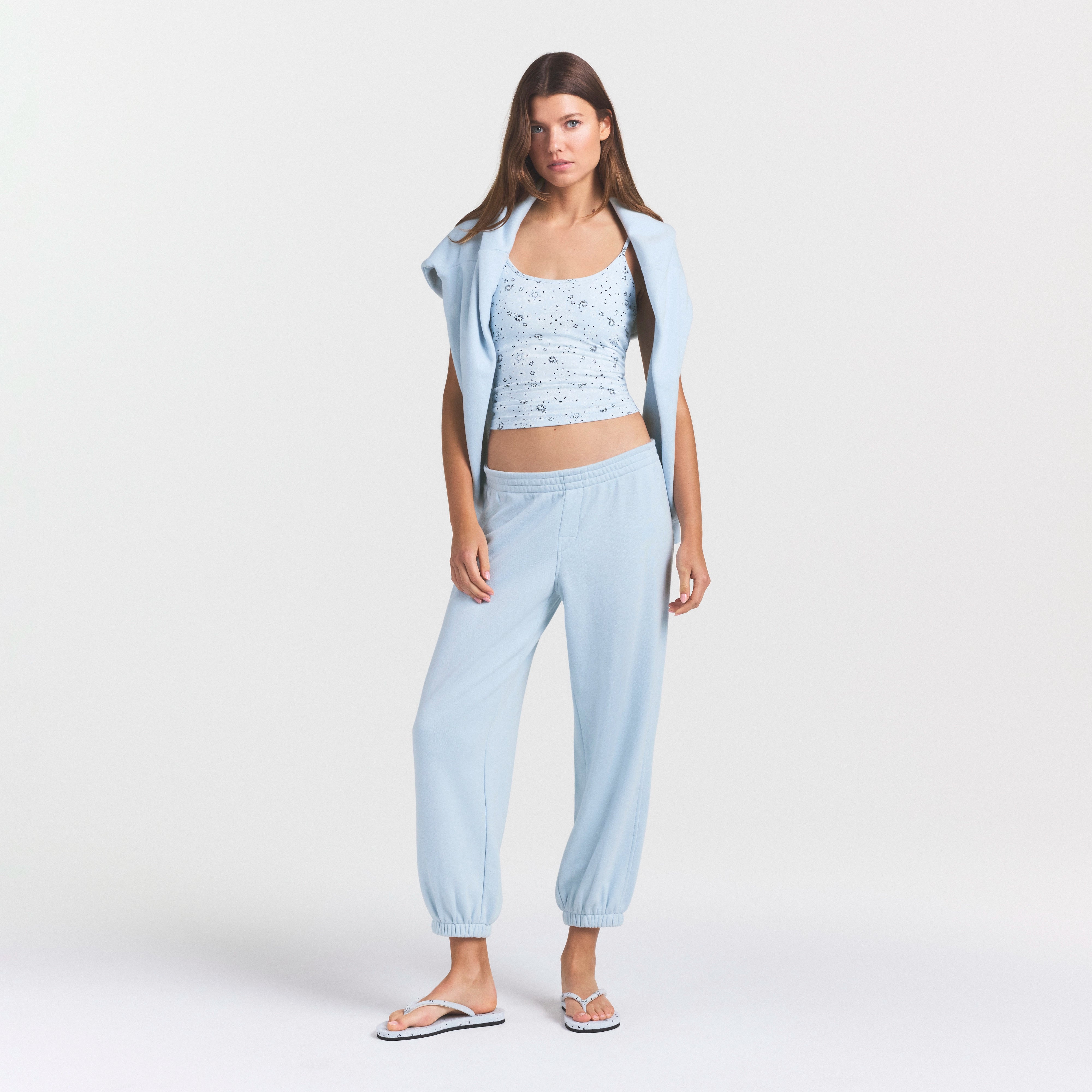 DRAPEY FRENCH TERRY CROPPED JOGGER | POWDER BLUE ON A MODEL FRONT VIEW @ | FOCUS: 0.0, 1.0, 0.9