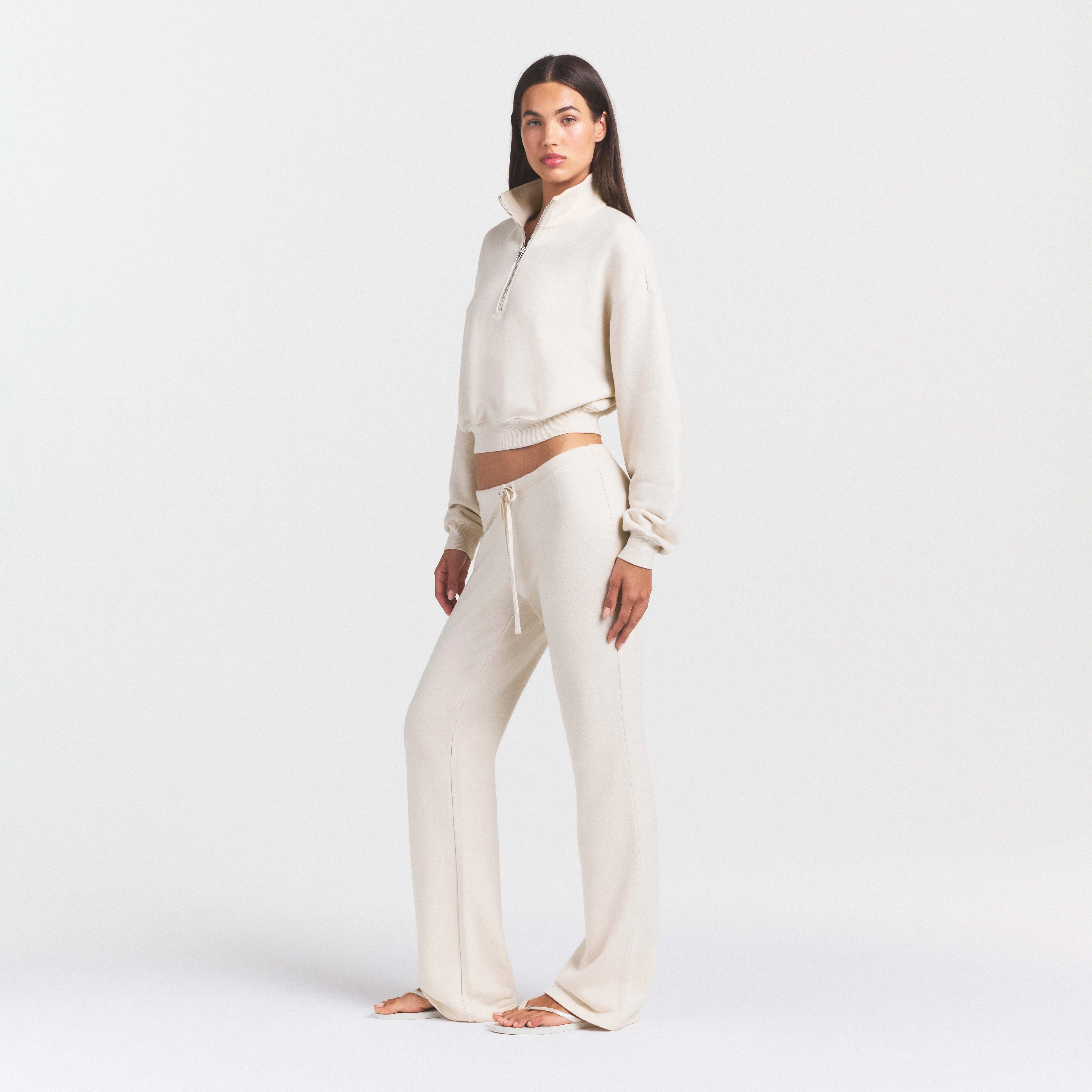 DRAPEY FRENCH TERRY STRAIGHT LEG PANT | BUFF ON A MODEL SIDE VIEW @ | FOCUS: 0.0, 1.0, 0.9