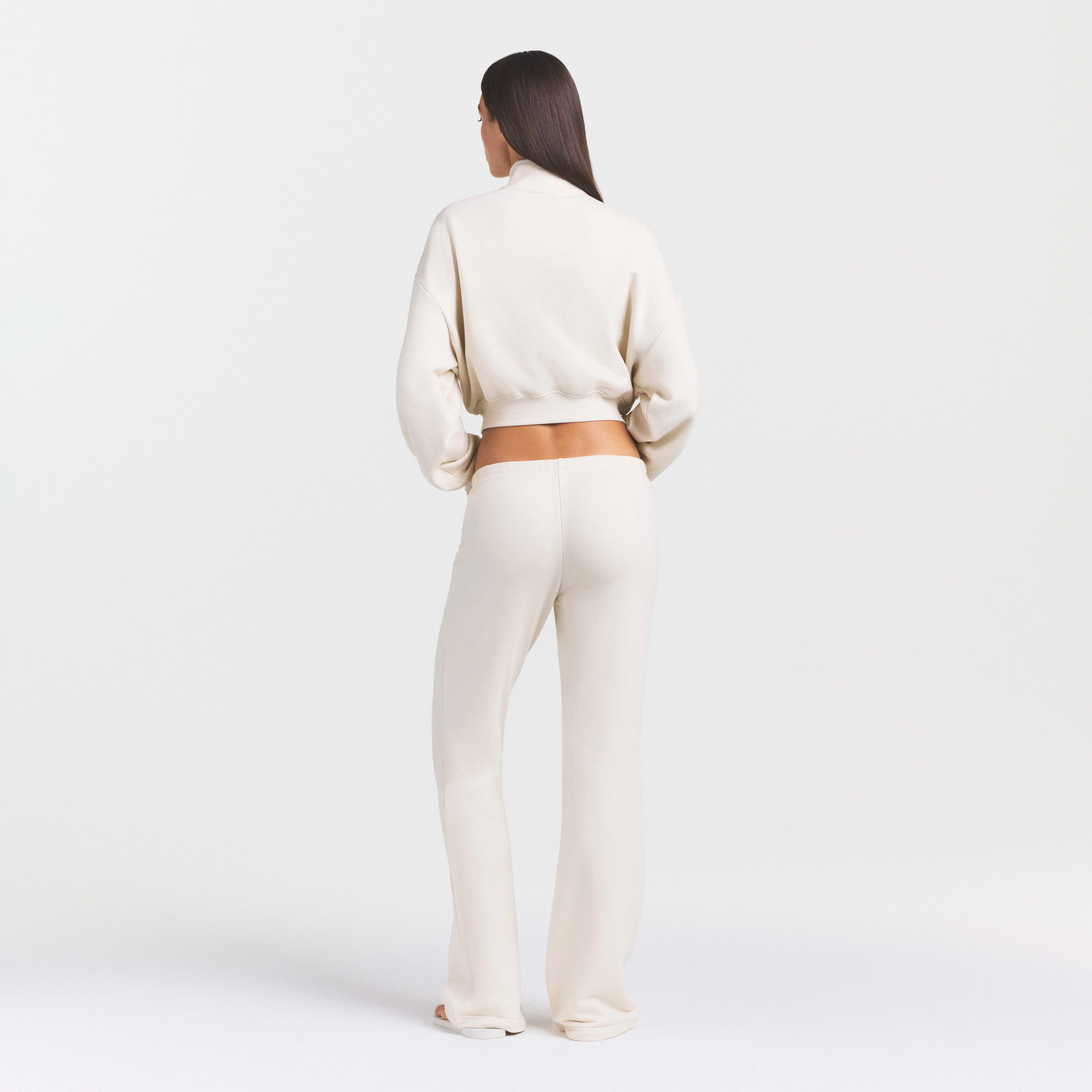 DRAPEY FRENCH TERRY STRAIGHT LEG PANT | BUFF ON A MODEL SIDE VIEW @ | FOCUS: 0.0, 1.0, 0.9