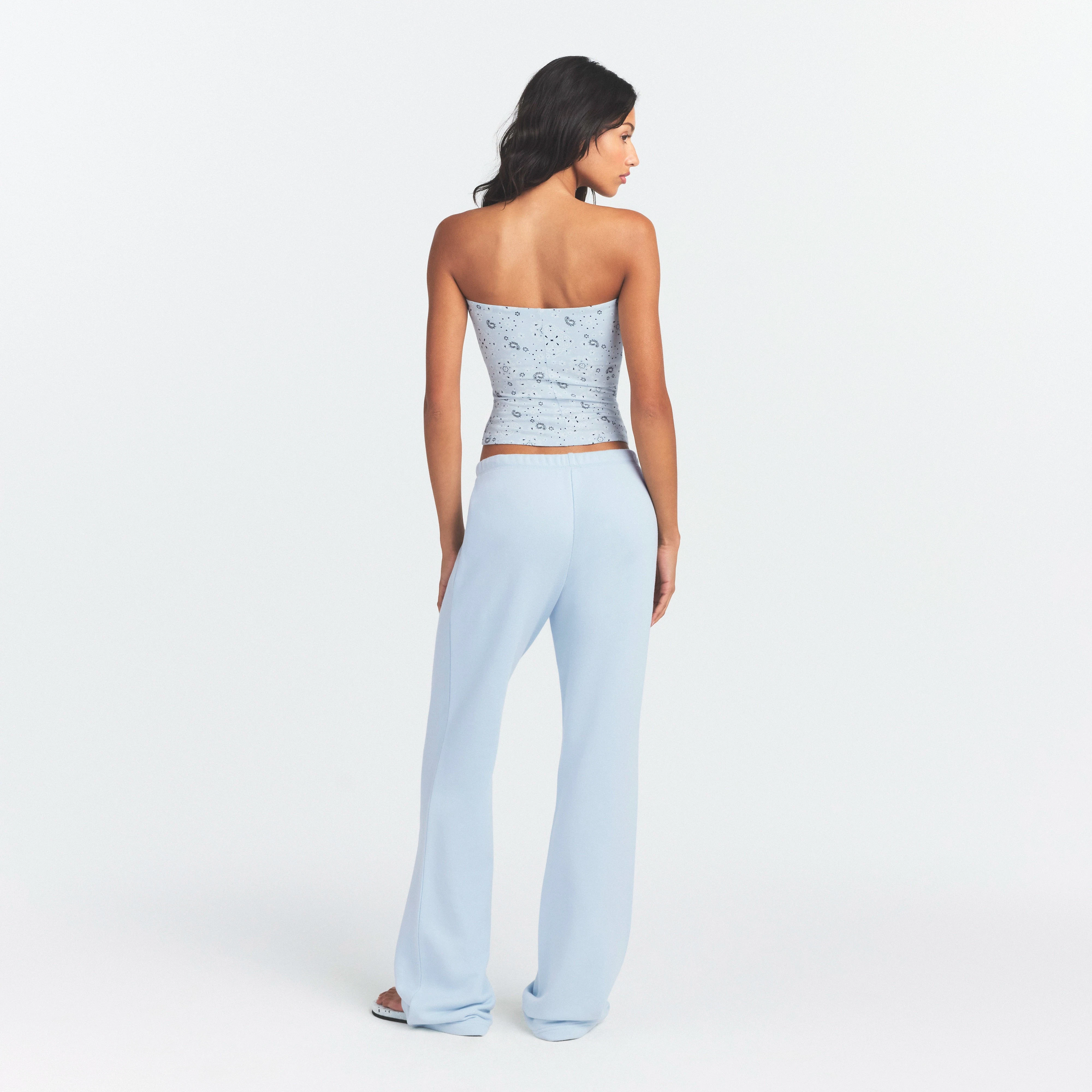 DRAPEY FRENCH TERRY STRAIGHT LEG PANT | POWDER BLUE ON A MODEL SIDE VIEW @ | FOCUS: 0.0, 1.0, 0.9