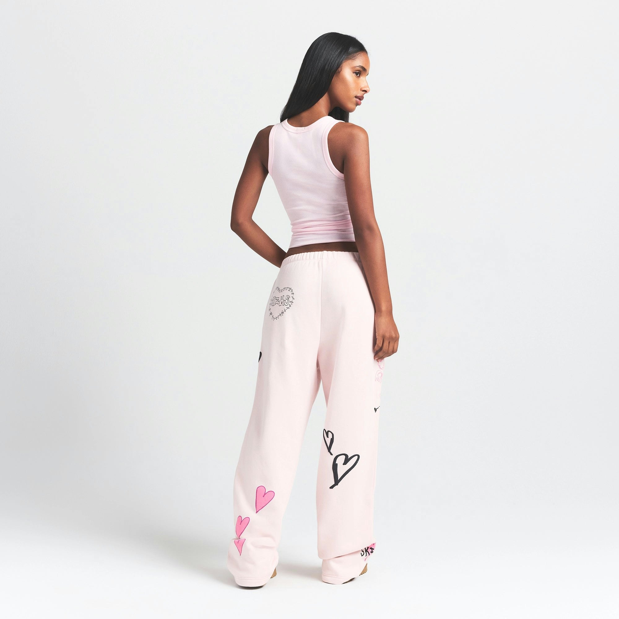 COTTON FLEECE CLASSIC STRAIGHT LEG PANT | BARELY PINK ANGEL SKETCH ON A MODEL BACK VIEW @ | FOCUS: 0.0, 1.0, 0.9
