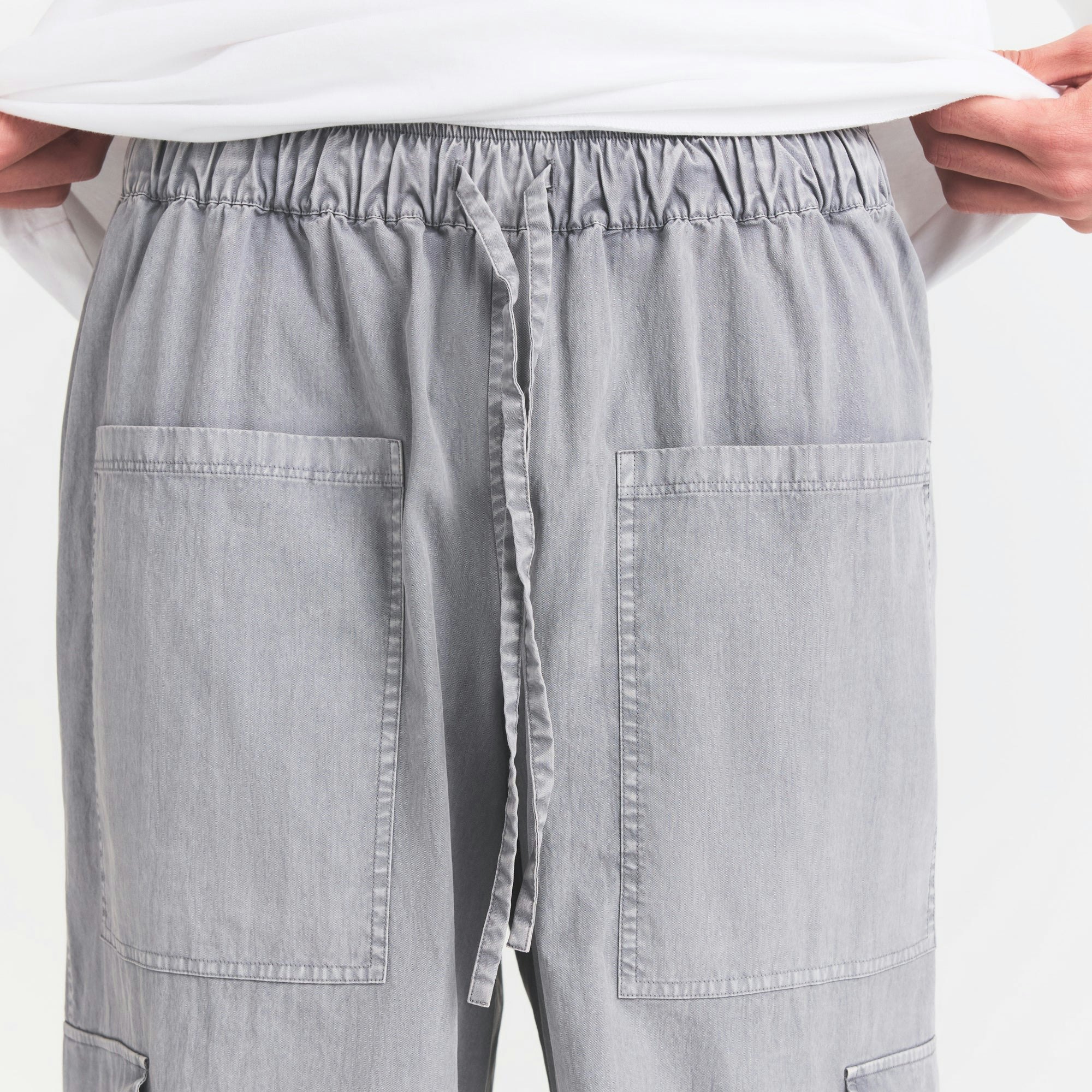 WOVEN MENS CARGO PANT | PACIFIC ON A MODEL SIDE VIEW @ | FOCUS: 0.0, 1.0, 0.9