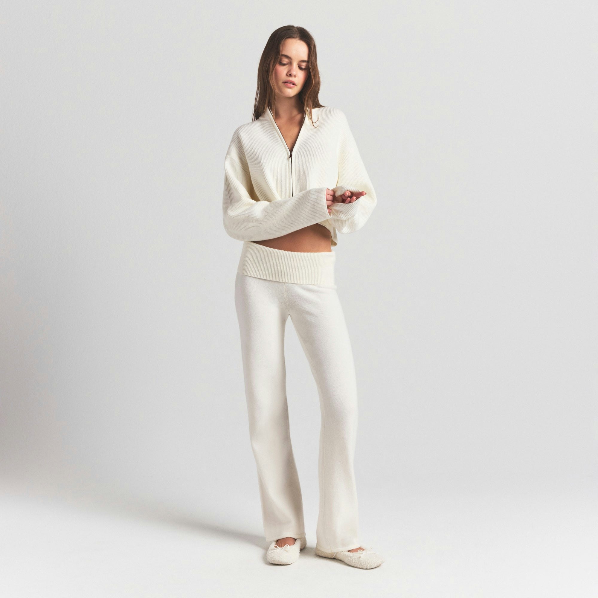 SWEATER KNITS PANT | IVORY ON A MODEL FRONT VIEW @ | FOCUS: 0.0, 1.0, 0.9