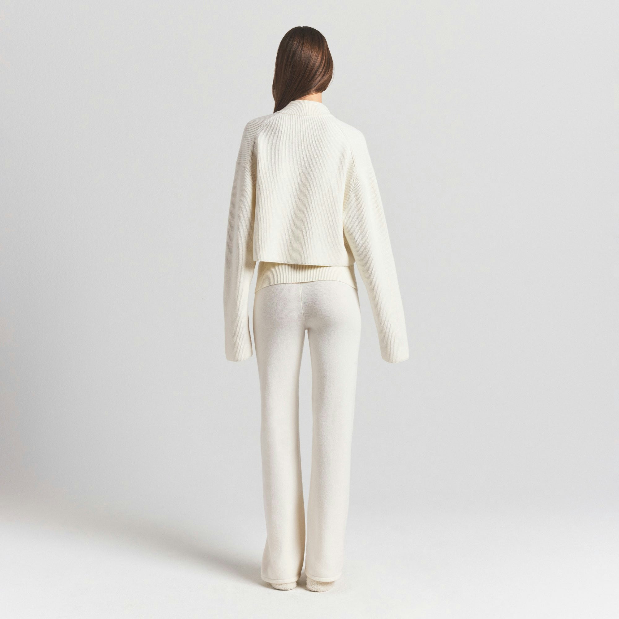 SWEATER KNITS PANT | IVORY ON A MODEL SIDE VIEW @ | FOCUS: 0.0, 1.0, 0.9