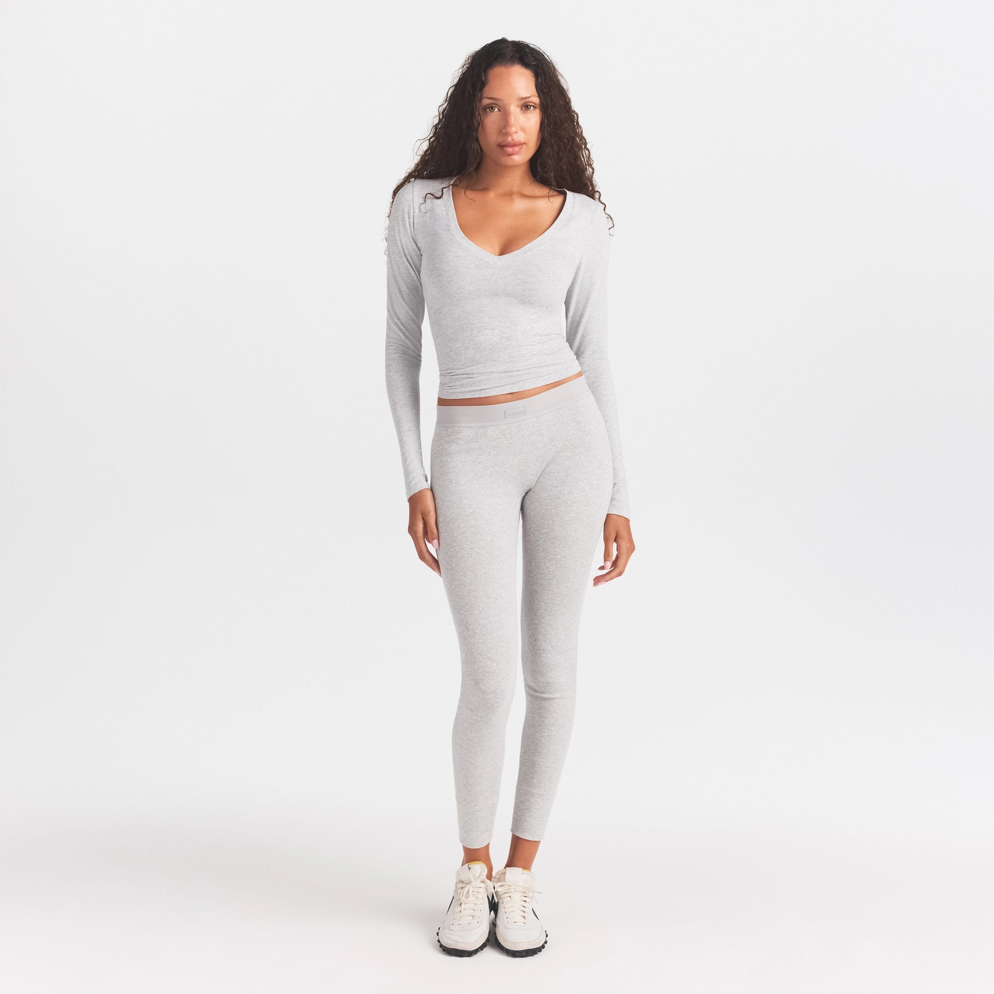 COTTON RIB MID RISE LEGGING | LIGHT HEATHER GREY ON A MODEL FRONT VIEW