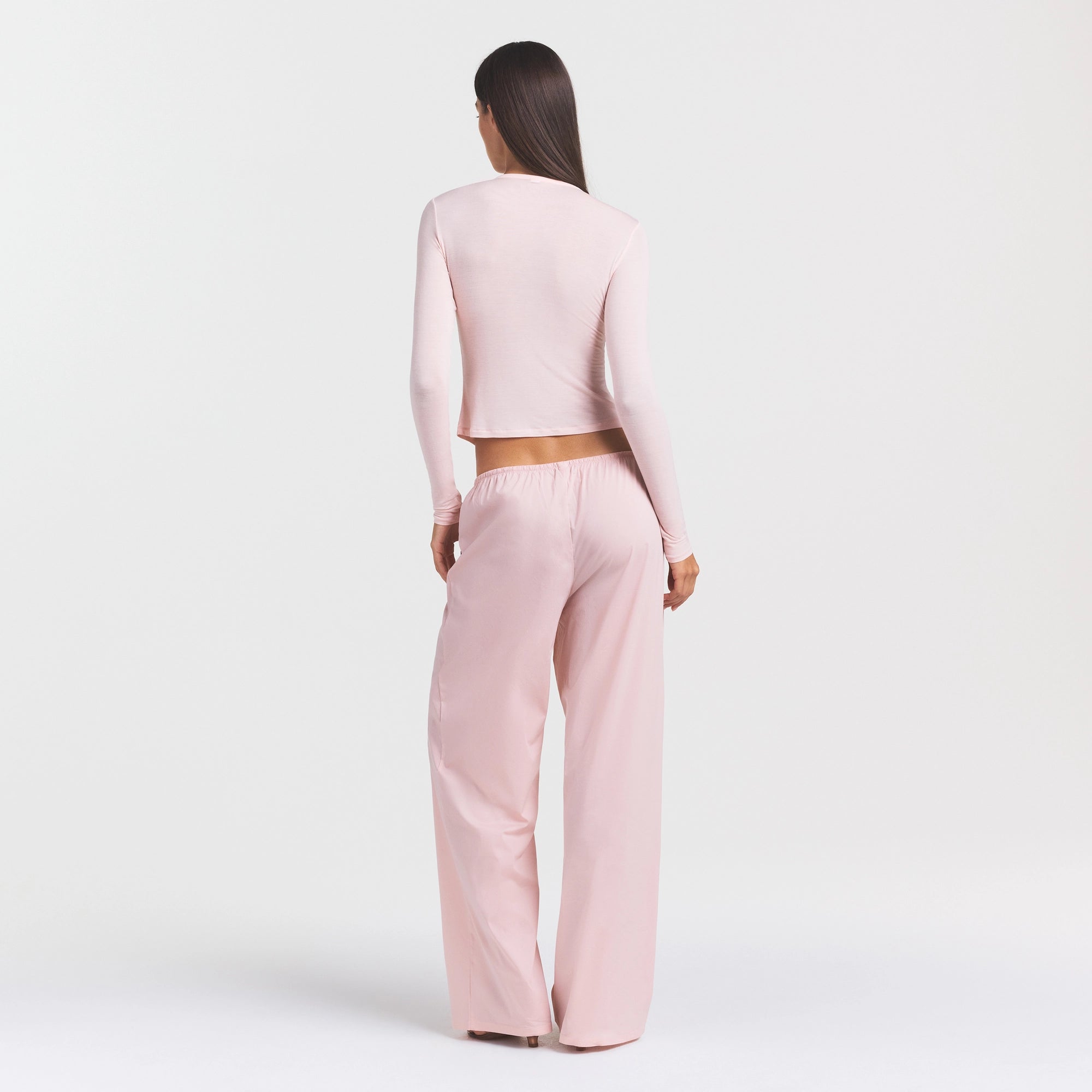 COTTON POPLIN PANT | DUSTY PINK ON A MODEL FRONT VIEW @ | FOCUS: 0.0, 1.0, 0.9