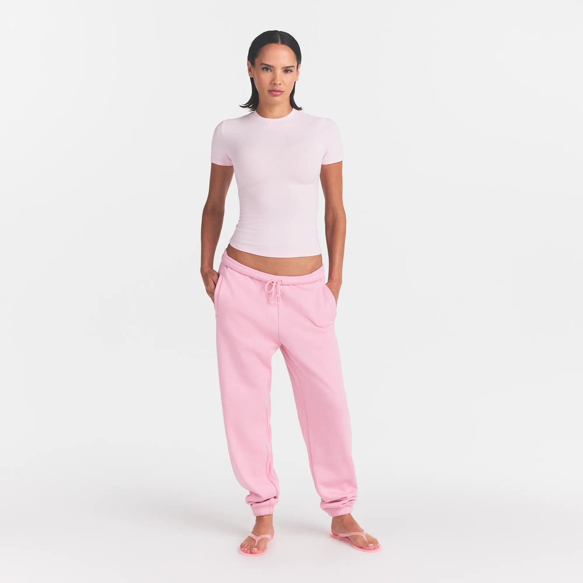 COTTON FLEECE JOGGER | HALITE WITH SNOW LOGO ON A MODEL FRONT VIEW @ | FOCUS: 0.0, 1.0, 0.9