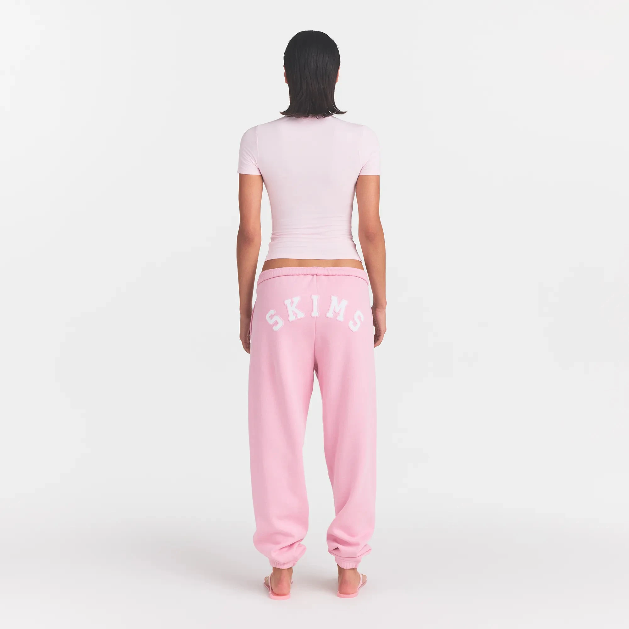 COTTON FLEECE JOGGER | HALITE WITH SNOW LOGO ON A MODEL BACK VIEW @ | FOCUS: 0.0, 1.0, 0.9