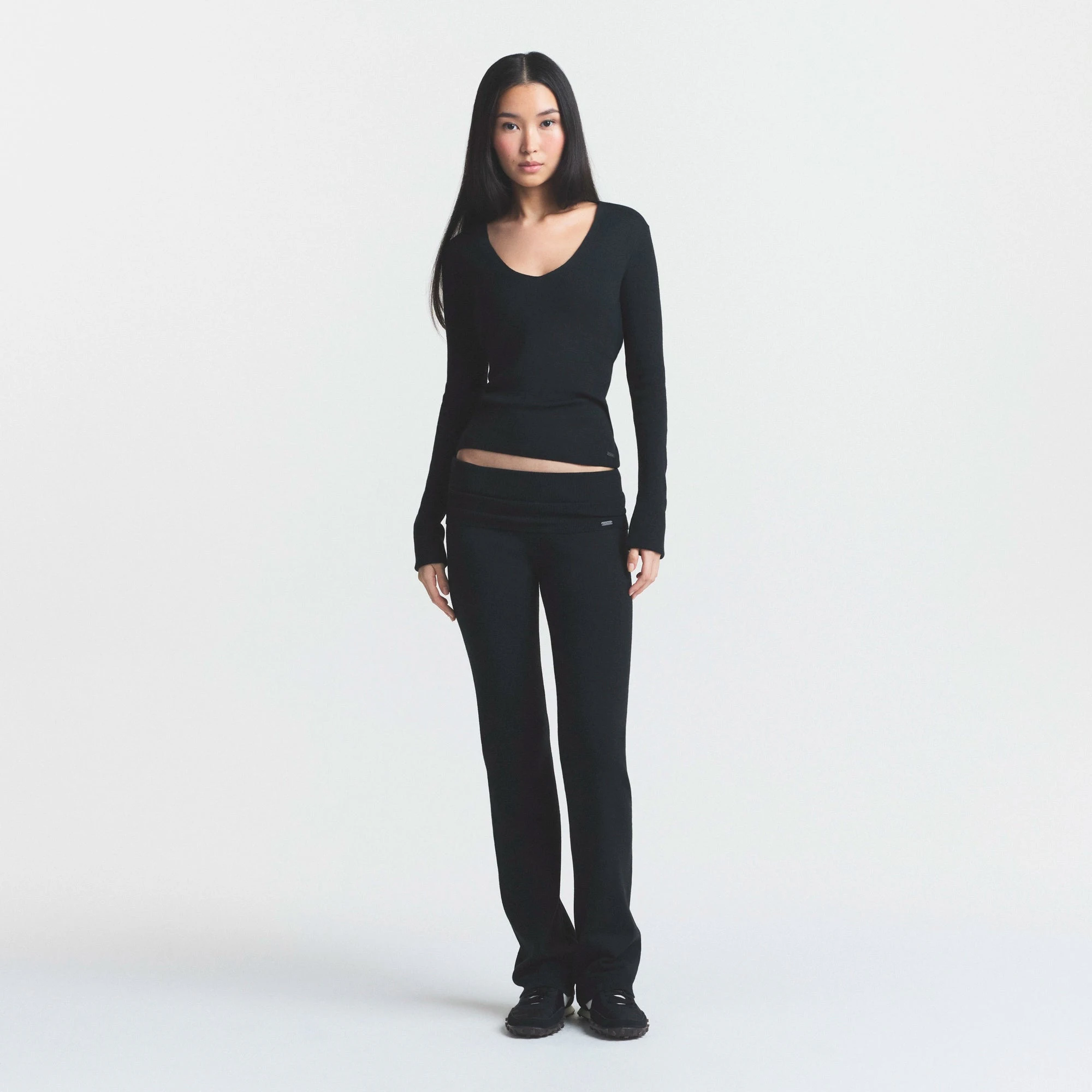 ESSENTIAL SWEATERS FOLDOVER PANT | ONYX & LAYS FLAT ON A WHITE BACKGROUND | FLT @ | FOCUS: 0.0, 1.0, 0.9