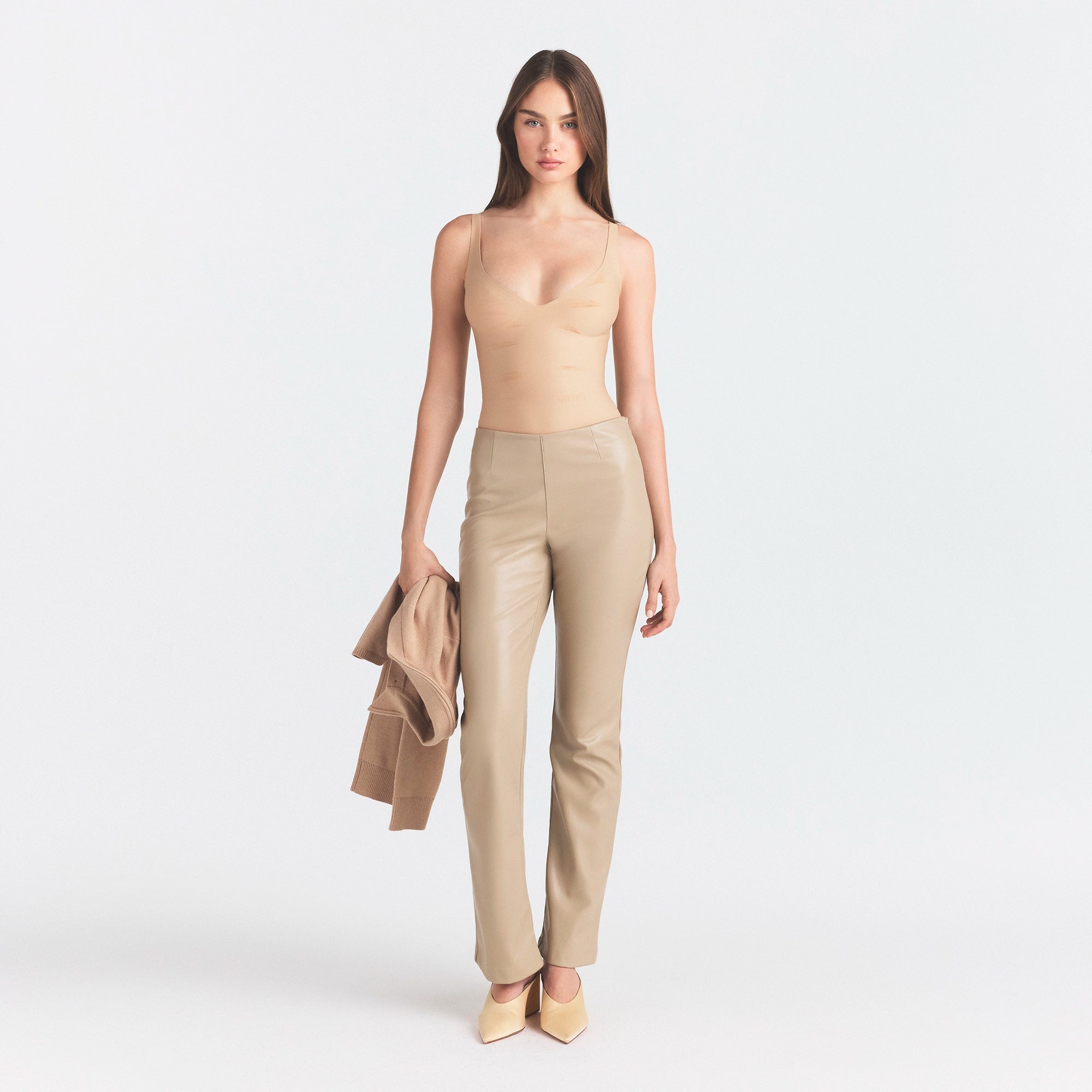 FAUX LEATHER PANT | LATTE & LAYS FLAT ON A WHITE BACKGROUND | FLT @ | FOCUS: 0.0, 1.0, 0.9