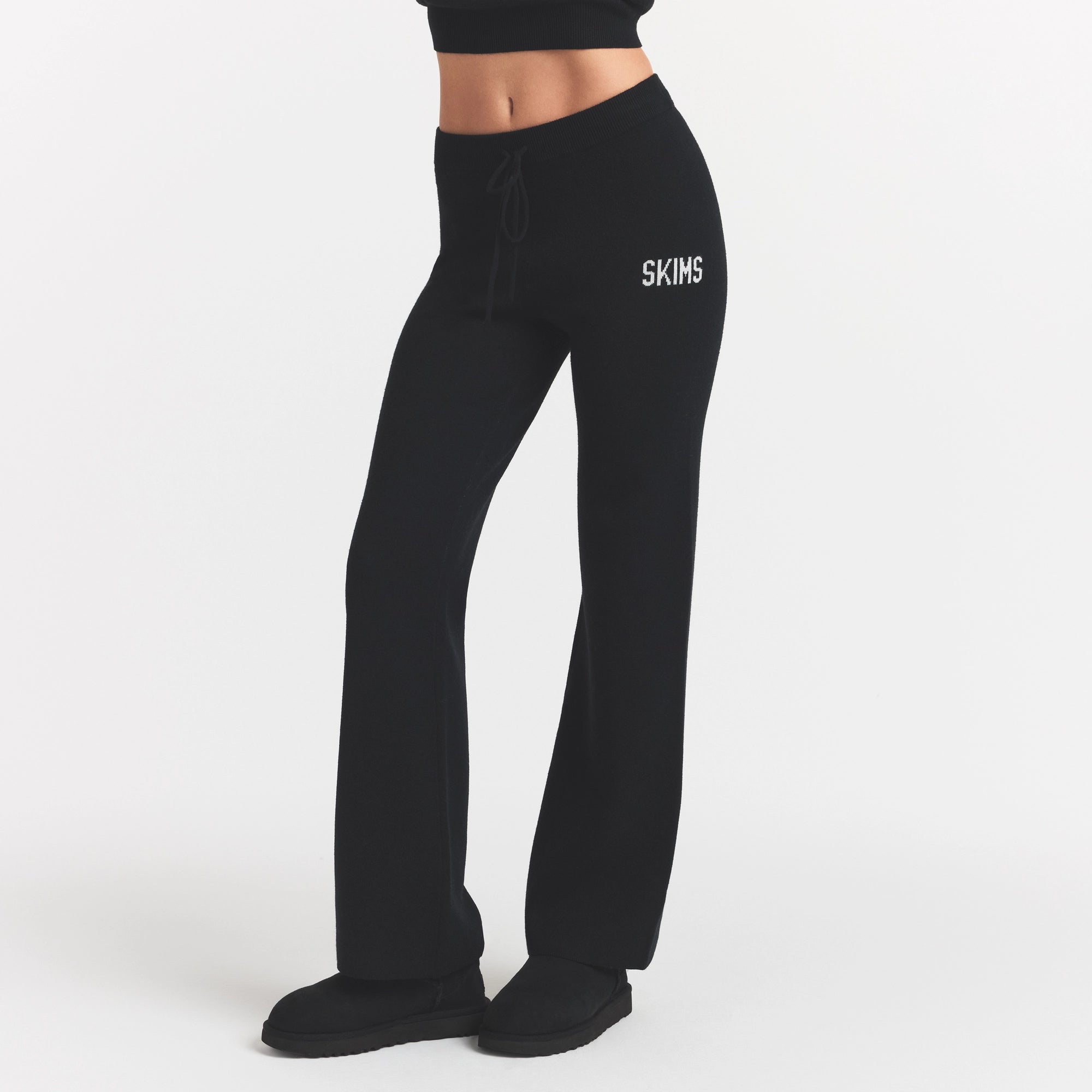 SWEATER KNIT LOGO PANT | ONYX EGRET & LAYS FLAT ON A WHITE BACKGROUND | FLT @ | FOCUS: 0.0, 1.0, 0.9