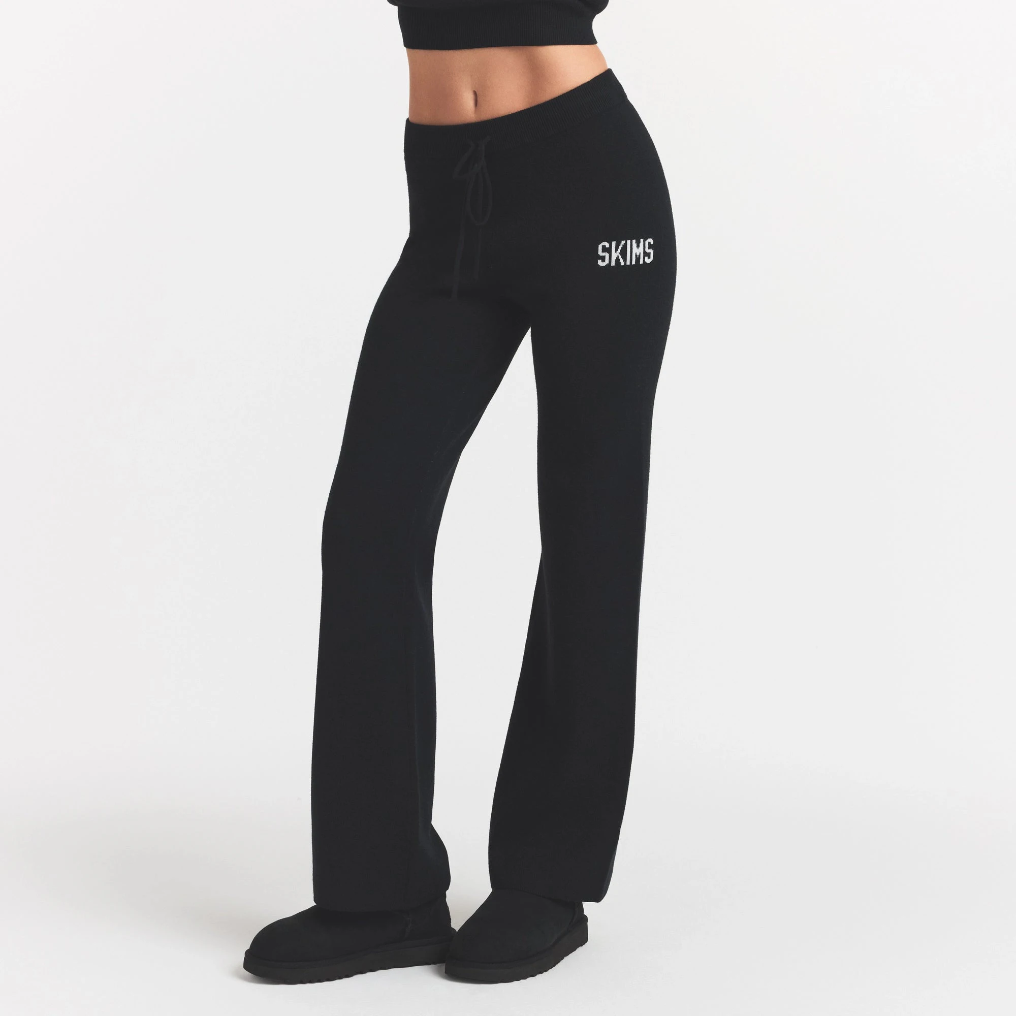 SWEATER KNIT LOGO PANT | ONYX EGRET & LAYS FLAT ON A WHITE BACKGROUND | FLT @ | FOCUS: 0.0, 1.0, 0.9