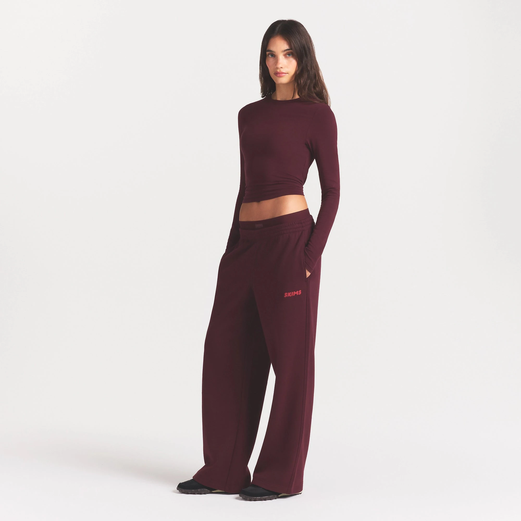 COTTON FLEECE DOUBLE WAISTBAND PANT WITH EMBOSSED LOGO | CURRANT ON A MODEL FRONT VIEW @ | FOCUS: 0.0, 1.0, 0.9