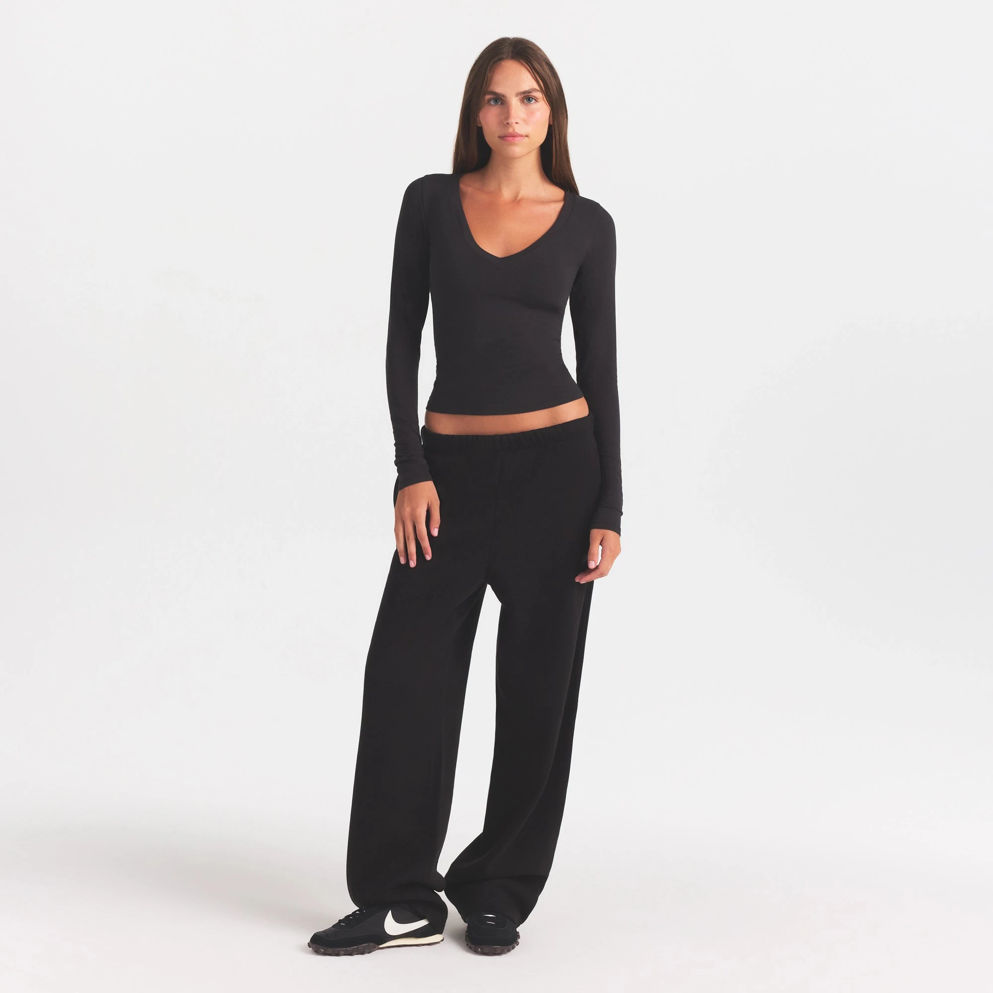 COTTON FLEECE STRAIGHT LEG PANT WITH EMBOSSED LOGO | ONYX ON A MODEL FRONT VIEW @ | FOCUS: 0.0, 1.0, 0.9