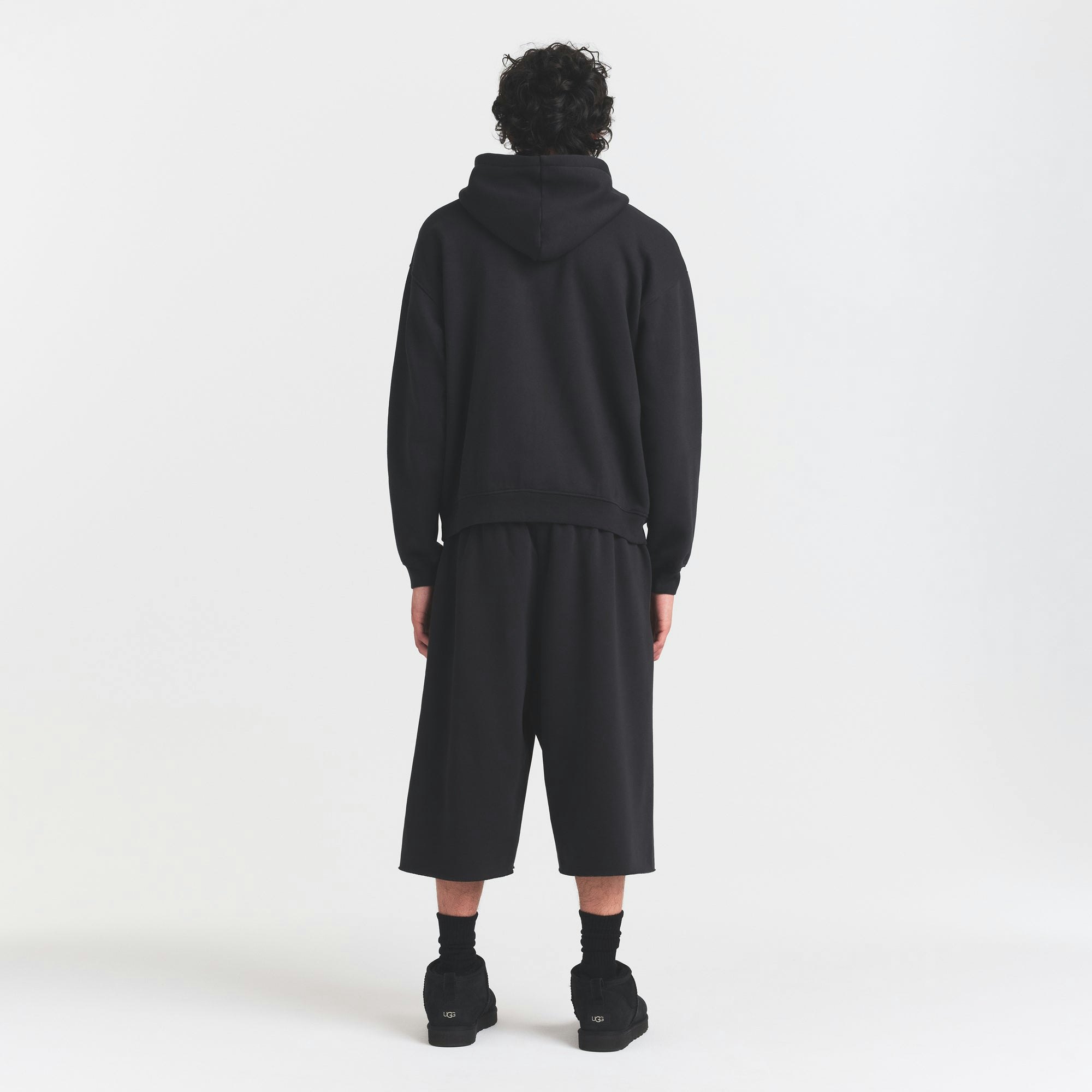 FLEECE LOUNGE MENS RELAXED LONG SHORT | WASHED ONYX ON A MODEL FRONT VIEW @ | FOCUS: 0.0, 1.0, 0.9