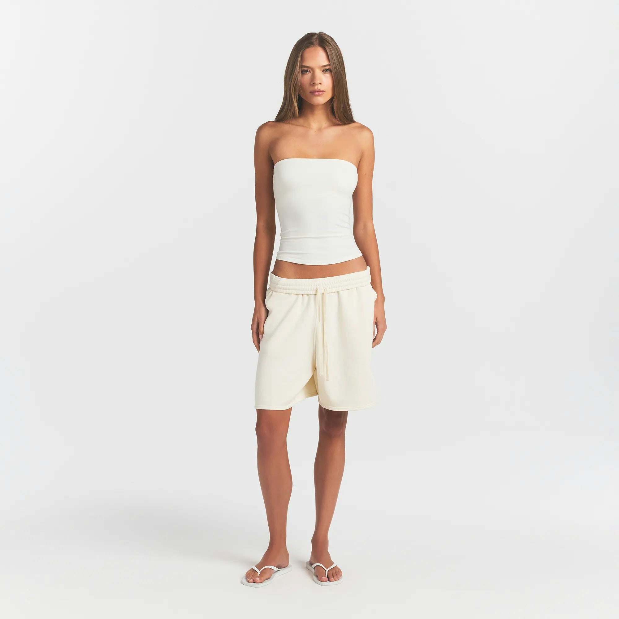 FRENCH TERRY LONG SHORT | ECRU ON A MODEL FRONT VIEW @ | FOCUS: 0.0, 1.0, 0.9