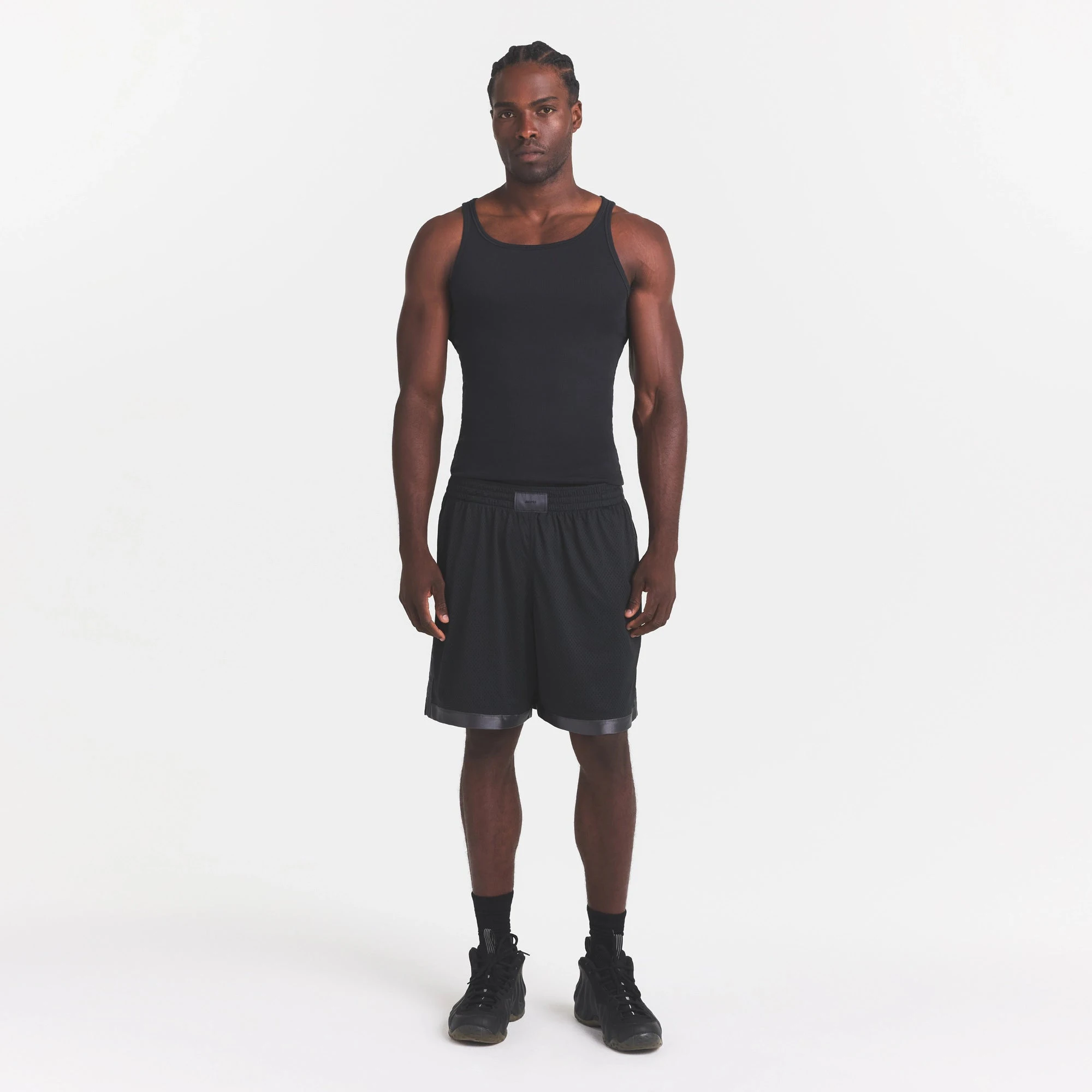MESH APPAREL MENS SHORT | ONYX ON A MODEL FRONT VIEW @ | FOCUS: 0.0, 1.0, 0.9