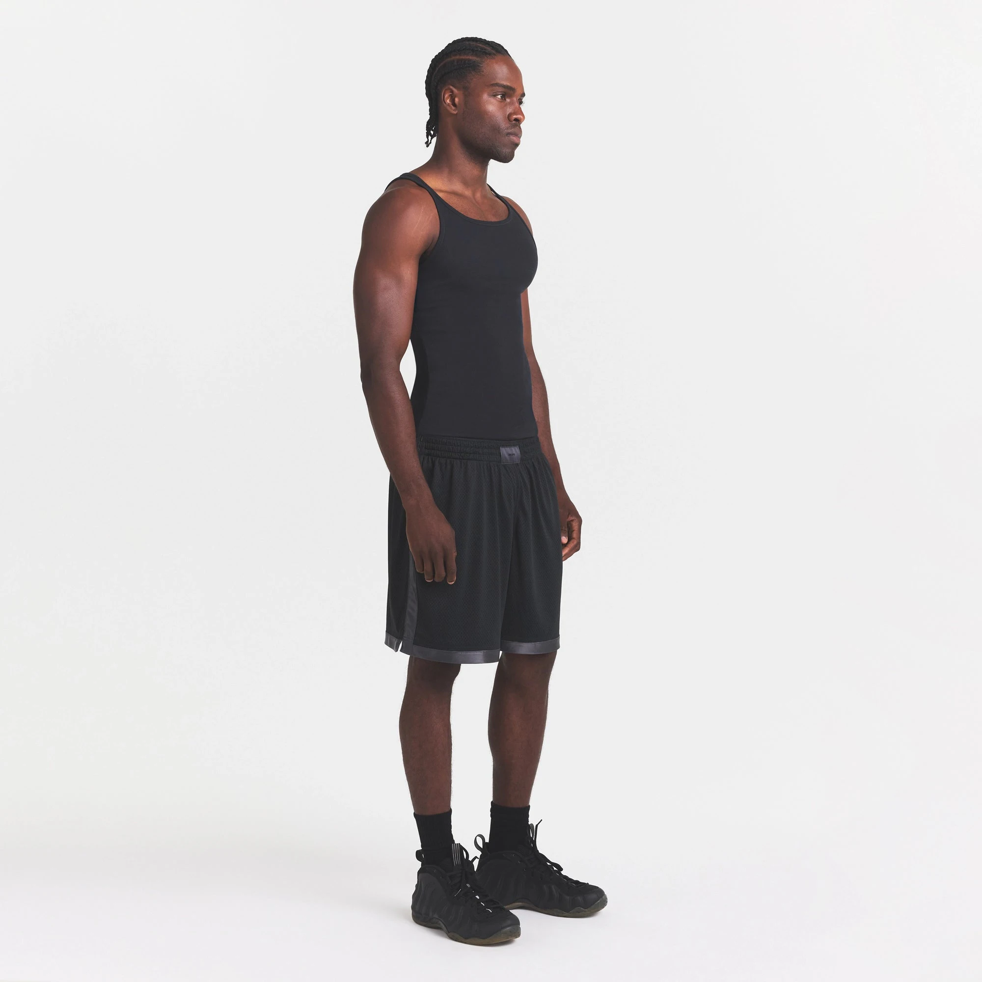 MESH APPAREL MENS SHORT | ONYX ON A MODEL FRONT VIEW @ | FOCUS: 0.0, 1.0, 0.9