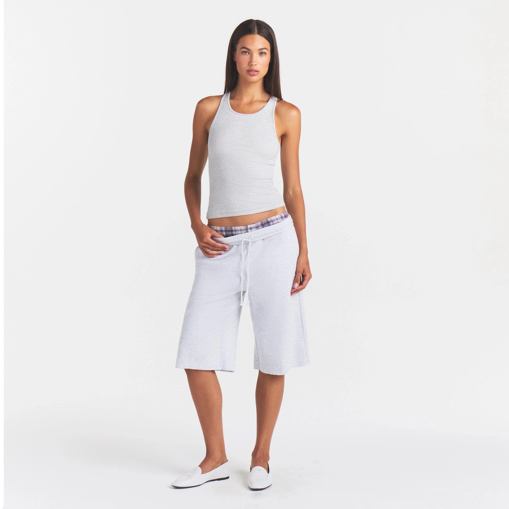 COTTON FLEECE LONG SHORT | LIGHT HEATHER GREY ON A MODEL FRONT VIEW