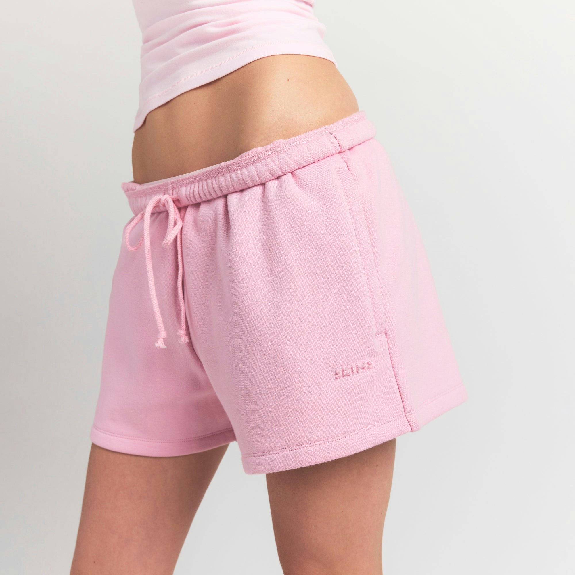 COTTON FLEECE CLASSIC SHORT | HALITE ON A MODEL FRONT VIEW @ | FOCUS: 0.9, 0.1, 0.7
