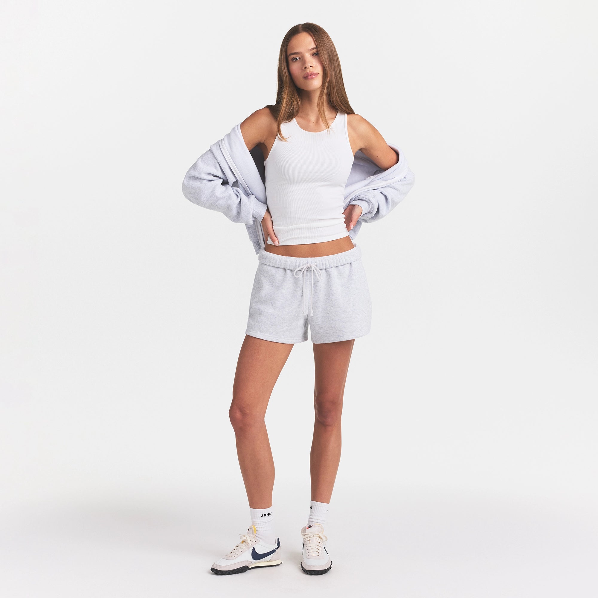 COTTON FLEECE CLASSIC SHORT | LIGHT HEATHER GREY ON A MODEL FRONT VIEW