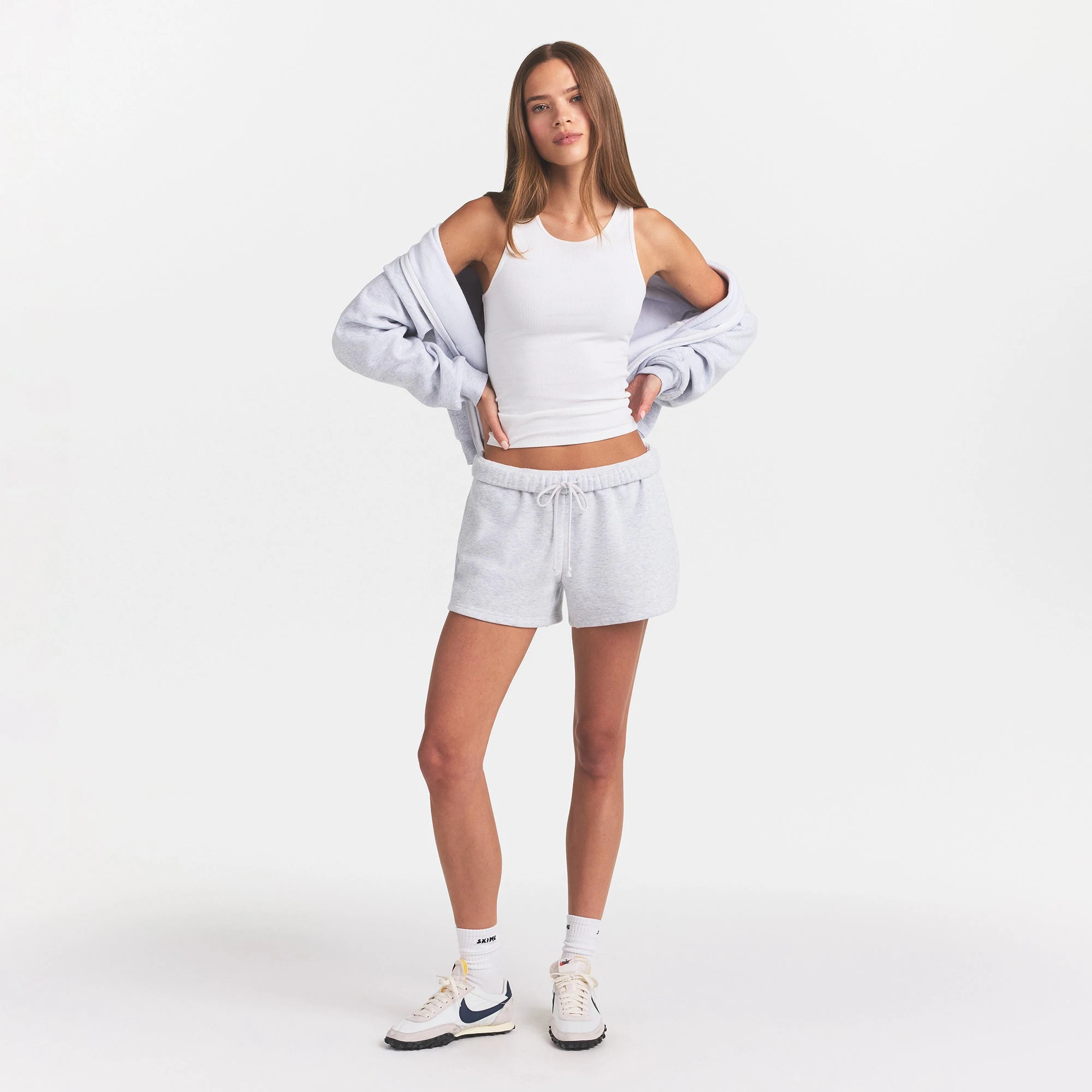 COTTON FLEECE CLASSIC SHORT | LIGHT HEATHER GREY ON A MODEL FRONT VIEW @ | FOCUS: 0.0, 1.0, 0.9