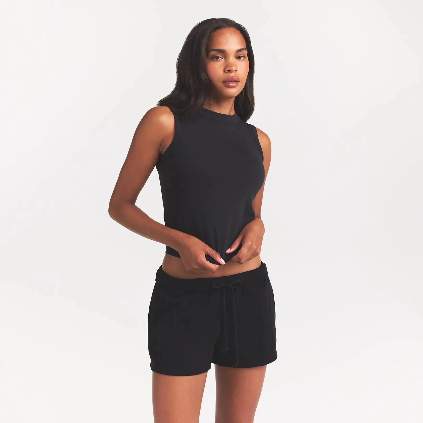 COTTON FLEECE CLASSIC SHORT | ONYX ON A MODEL SIDE VIEW @ | FOCUS: 0.0, 1.0, 0.9