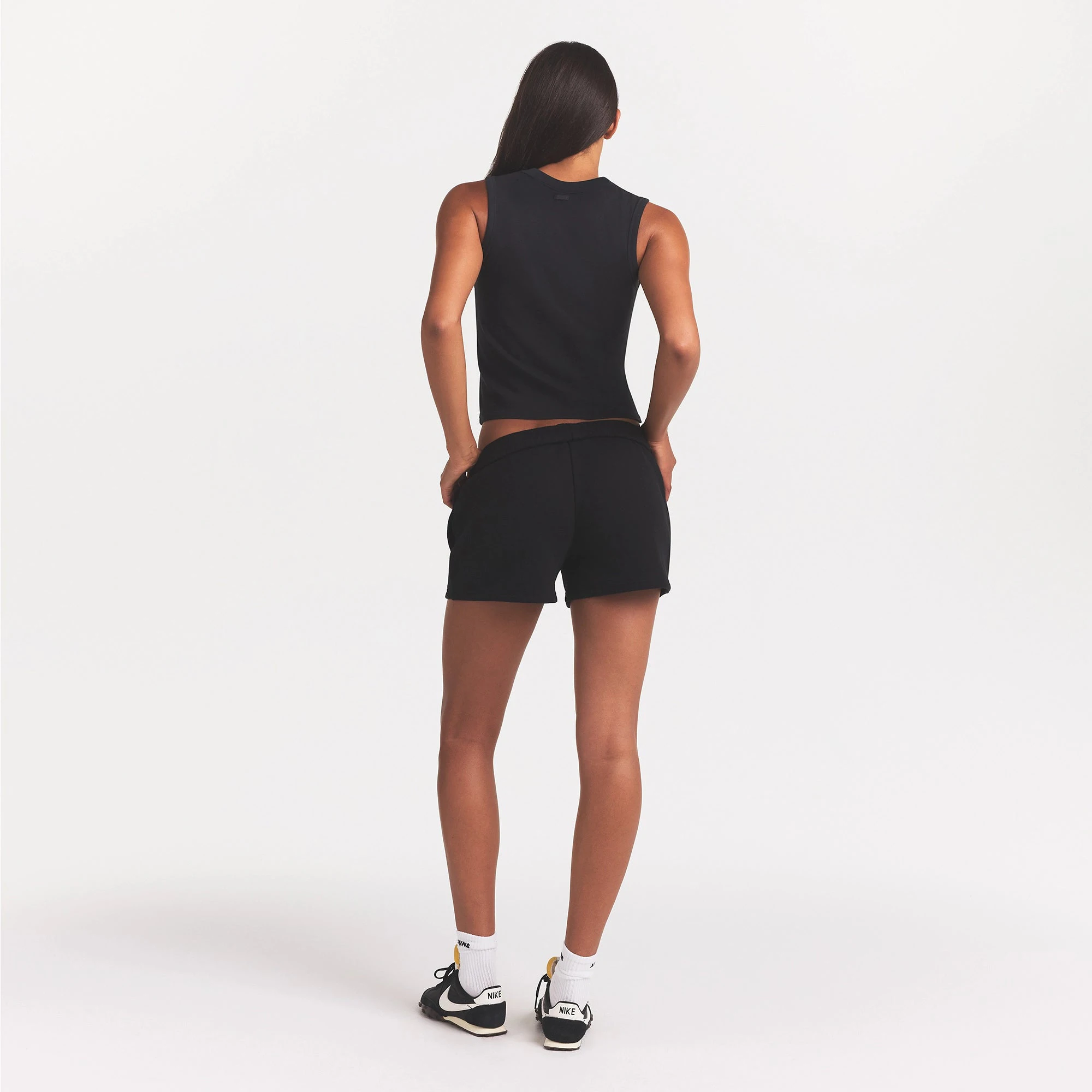 COTTON FLEECE CLASSIC SHORT | ONYX ON A MODEL BACK VIEW @ | FOCUS: 0.0, 1.0, 0.9