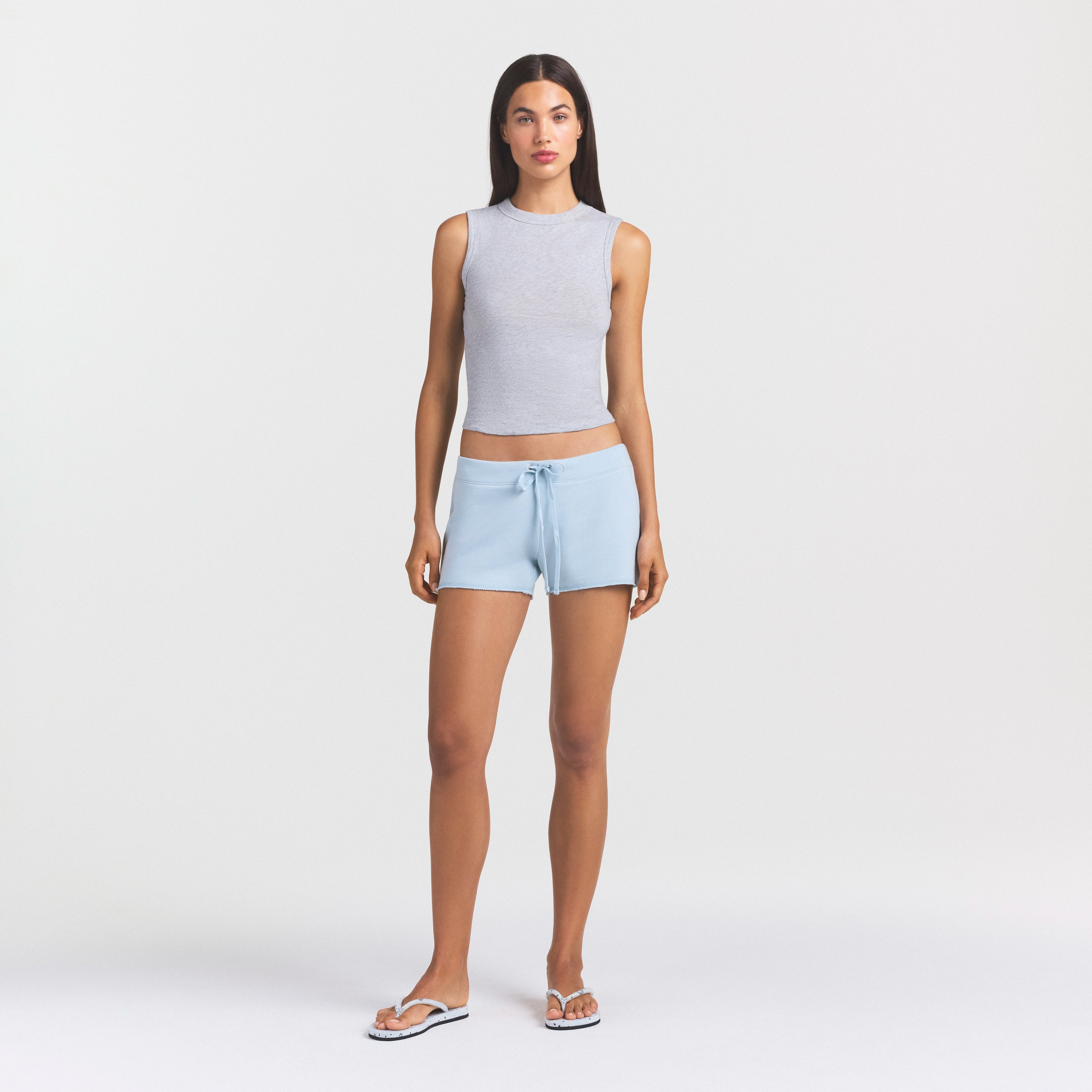 DRAPEY FRENCH TERRY SHORT | POWDER BLUE ON A MODEL FRONT VIEW @ | FOCUS: 0.0, 1.0, 0.9