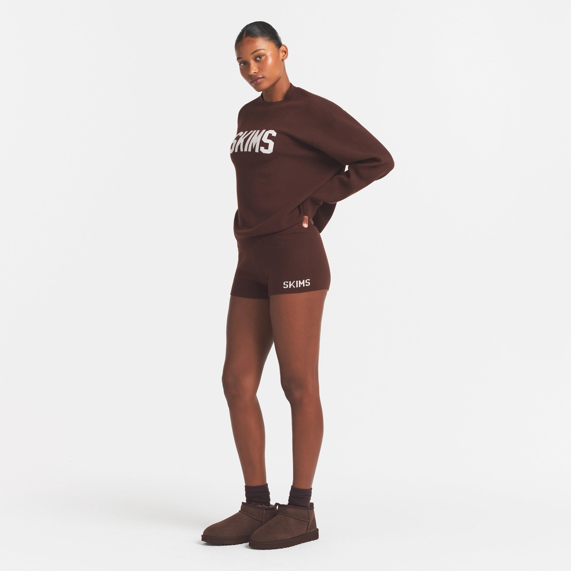 SWEATER KNIT LOGO SHORT | COCOA EGRET & LAYS FLAT ON A WHITE BACKGROUND | FLT @ | FOCUS: 0.0, 1.0, 0.9